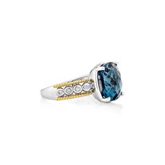 Sunita Nahata London Blue Topaz 8.12ct. Fancy Ring in 18KWYG with Diamond.