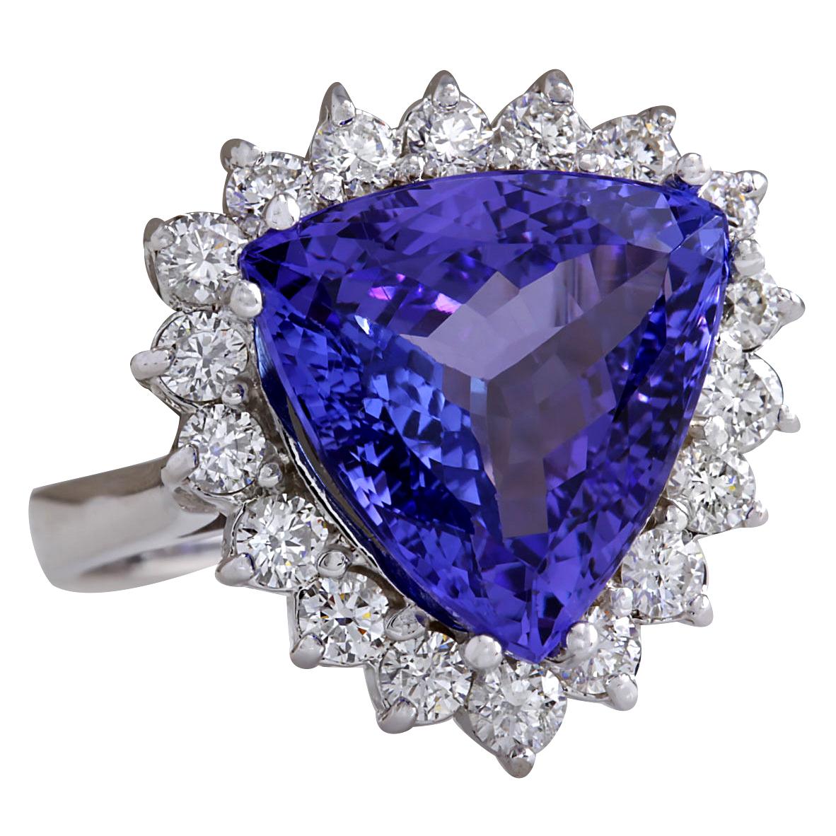 Introducing our exquisite 8.12 Carat Tanzanite 14 Karat White Gold Diamond Ring. Crafted from stamped 14K White Gold, this ring has a total weight of 6.8 grams, ensuring both quality and durability. The centerpiece is a stunning trillion-cut