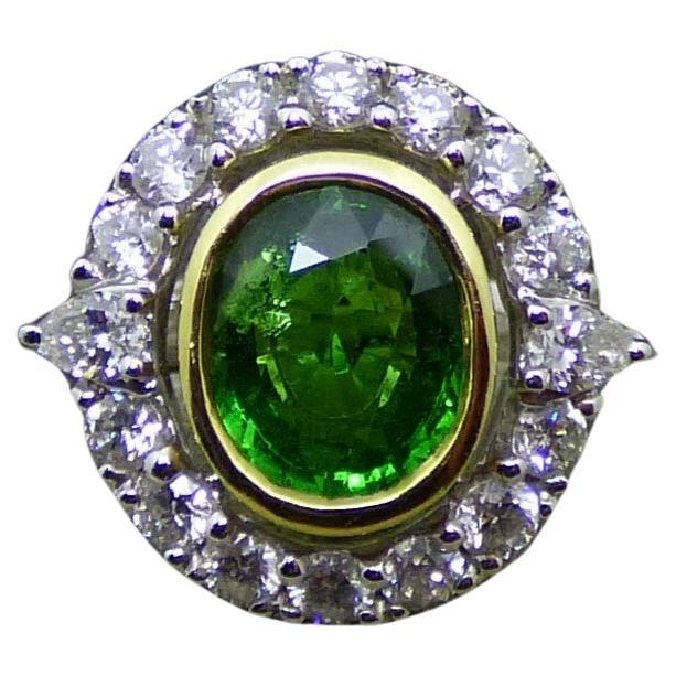 8.12ct Oval Tsavorite Garnet and Diamond Cluster Ring in 18K Gold For Sale