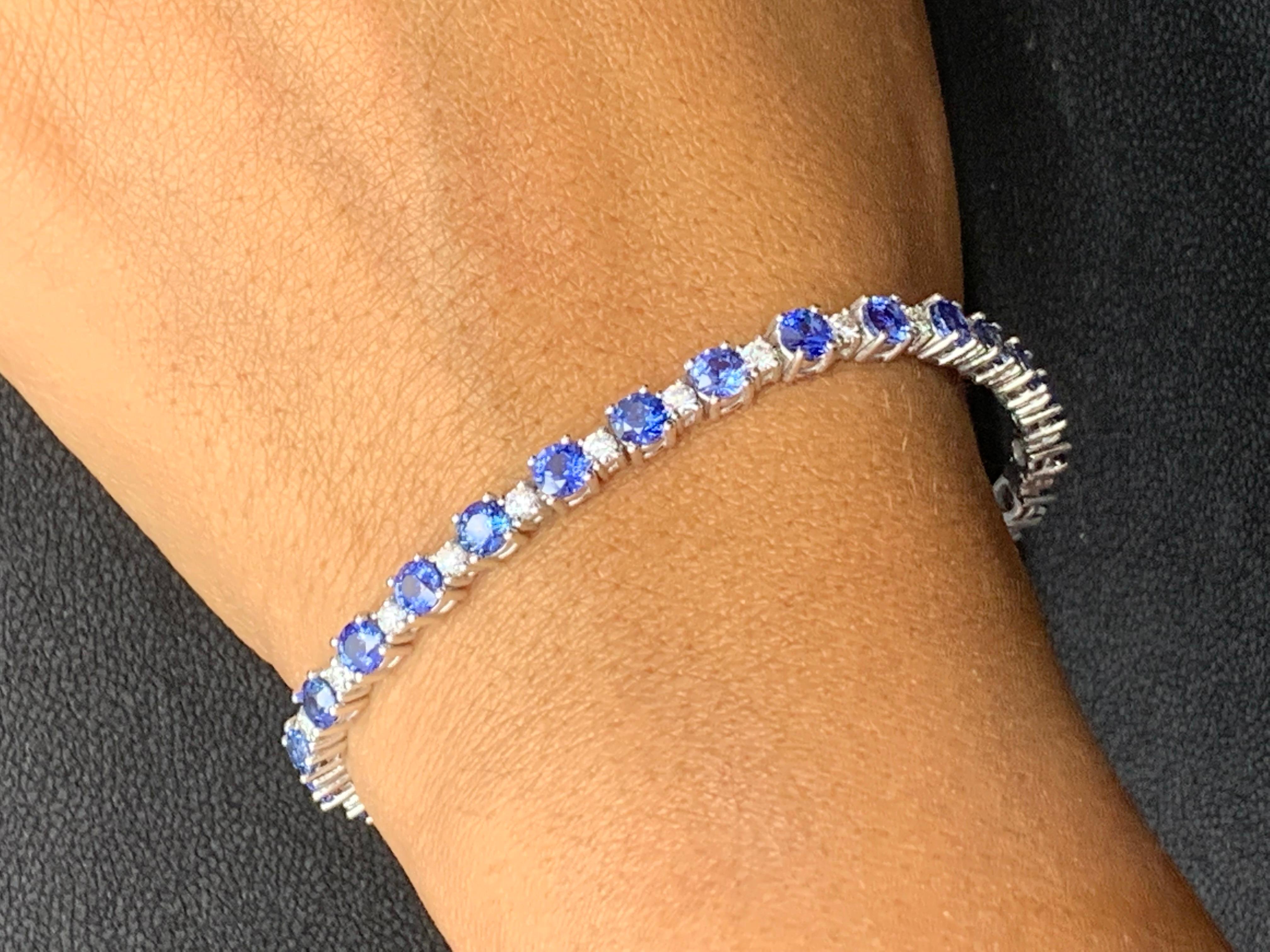 Showcasing 8.13 carats total of 27 blue sapphires, elegantly alternating with 1.48 carats of 27 round brilliant diamonds. Made in 14 karat white gold.

Style available in different price ranges. Prices are based on your selection of the 4C’s (Carat,