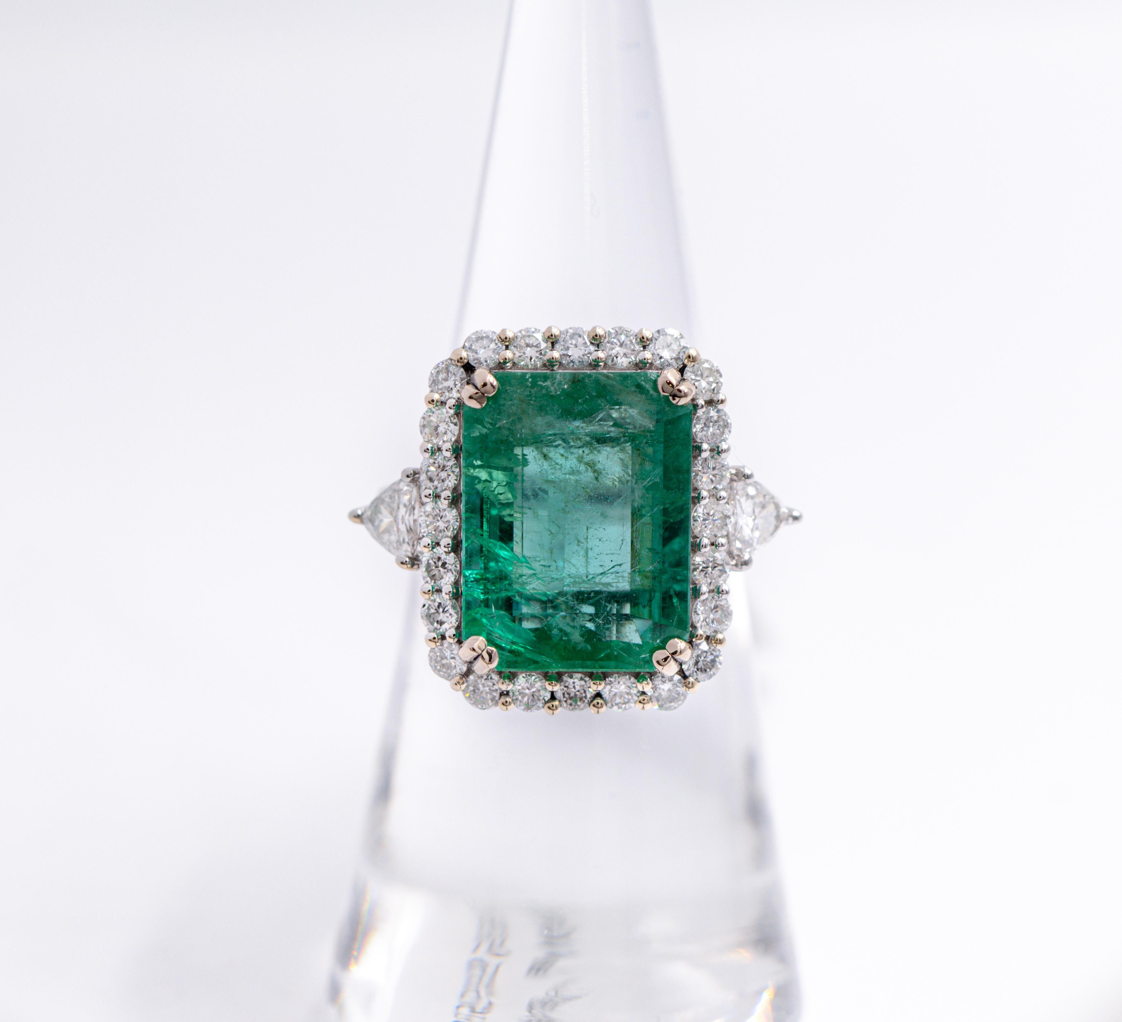 Elegant and classic gold ring with a dazzling emerald center stone accentuated by an all natural diamond halo.

Perfect for all occasions such as weddings, anniversaries, promise rings, birthdays, or just because!

Specifications

Item Type: