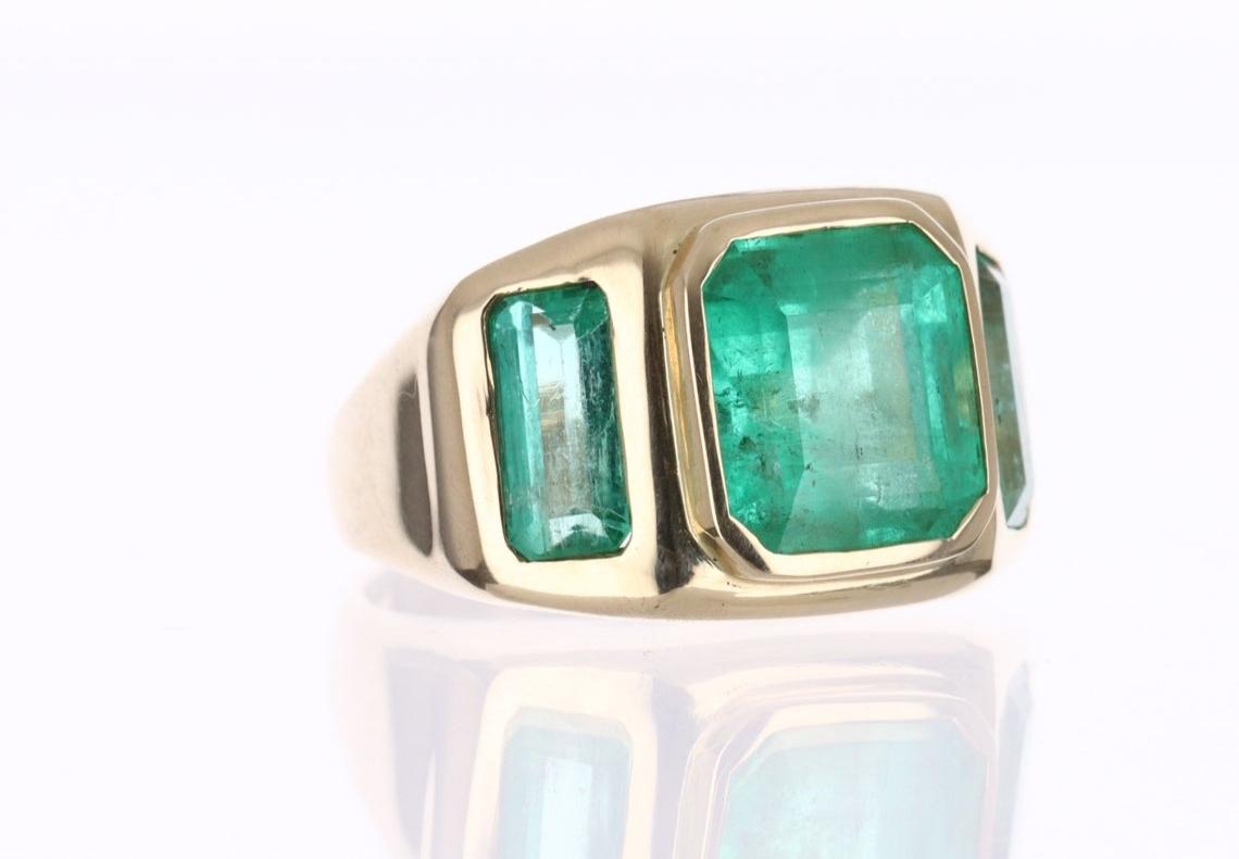 Modern 8.13tcw 14K Gypsy Three Stone Colombian Emerald, Emerald Cut Bezel Set Ring