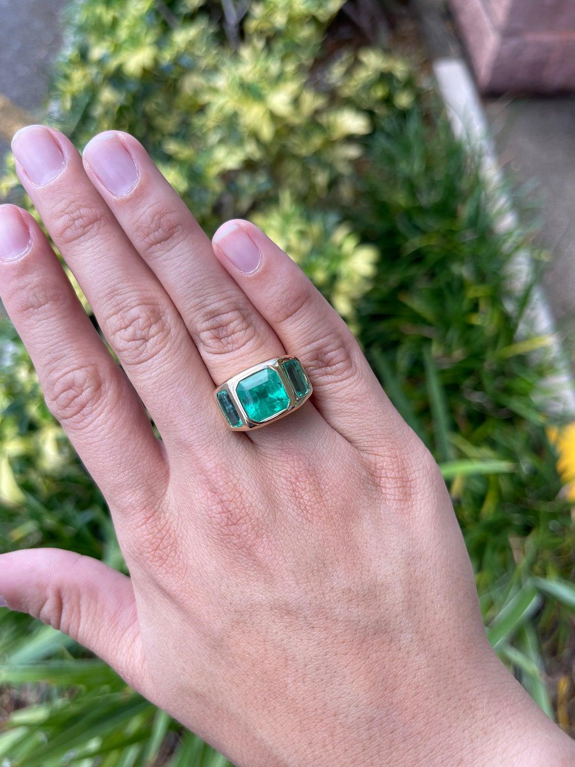 8.13tcw 14K Gypsy Three Stone Colombian Emerald, Emerald Cut Bezel Set Ring In New Condition In Jupiter, FL