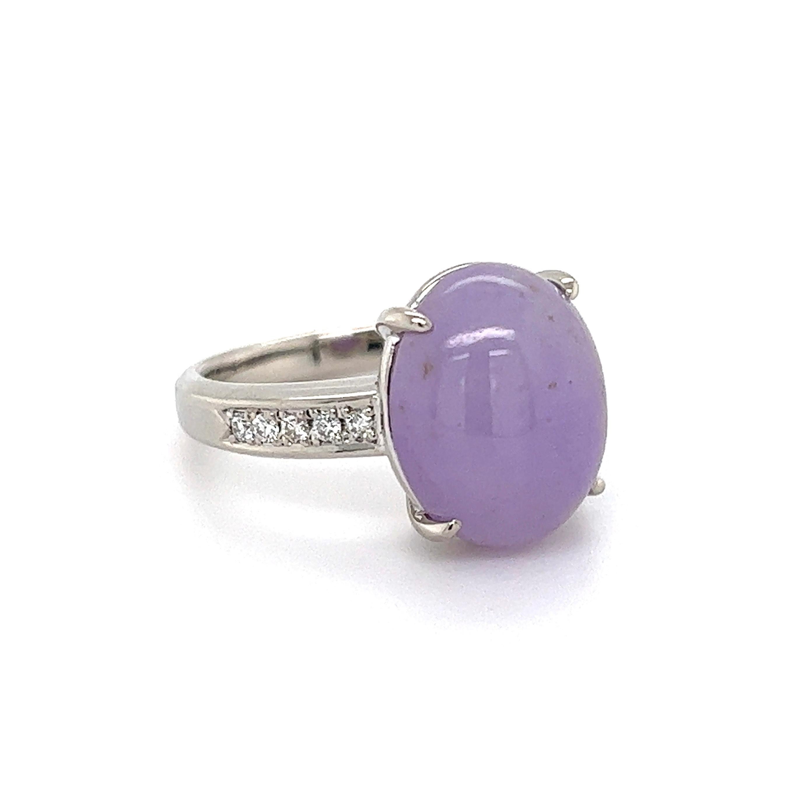 Simply Beautiful! Fnely detailed Lavender Jade and Diamond Cocktail Ring. Center securely set with an awesome 8.14 Carat Cabochon Lavender Jade, accented either side with Diamonds, weighing approx. 0.12tcw. Hand crafted Platinum mounting. Approx.