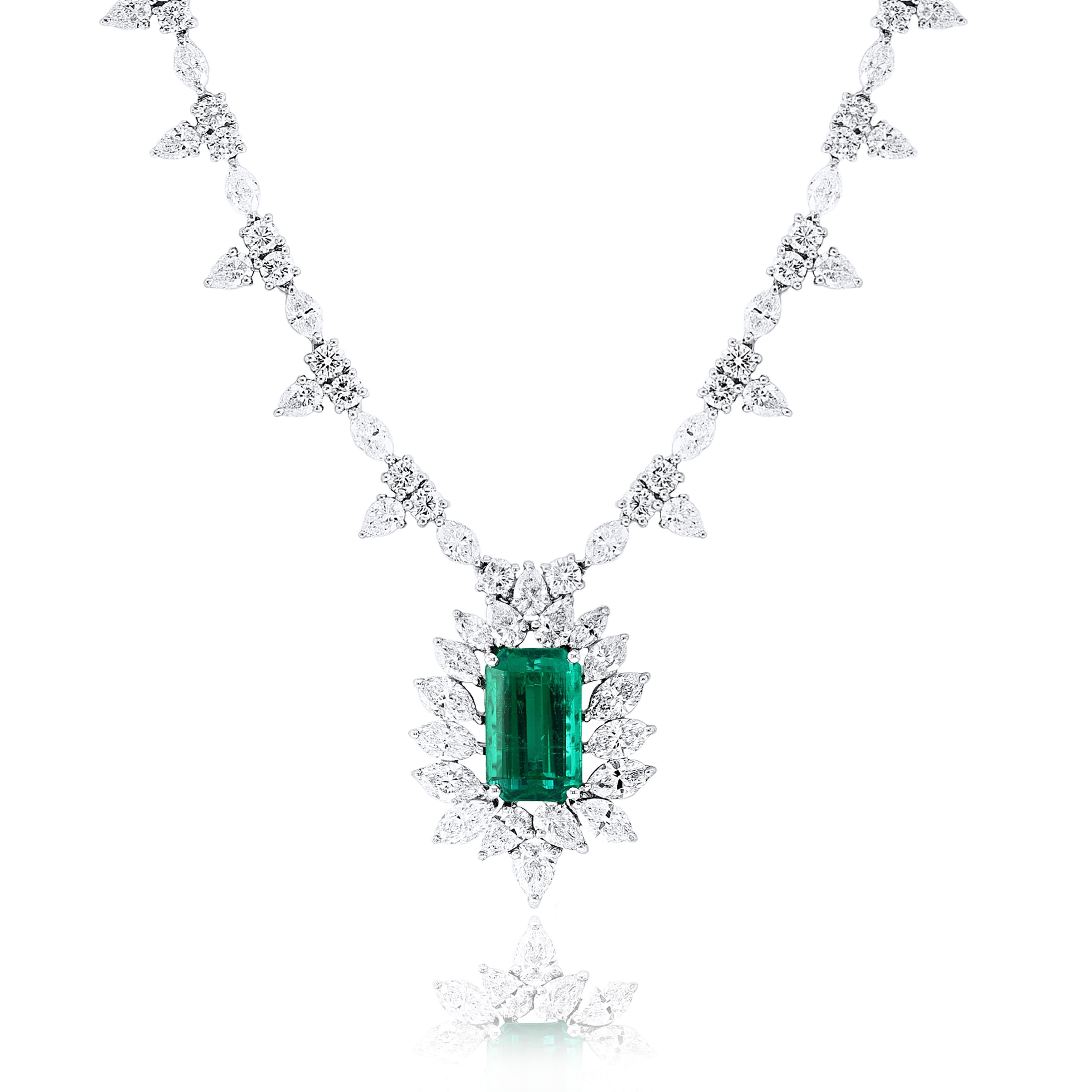 This luxuriously looking  CERTIFIED high-end drop necklace highlighting  1 emerald cut lush green emerald weighing 8.14 carats total set with pear & round shaped diamonds weighing 24.51 carats total. Hand-crafted in Platinum.