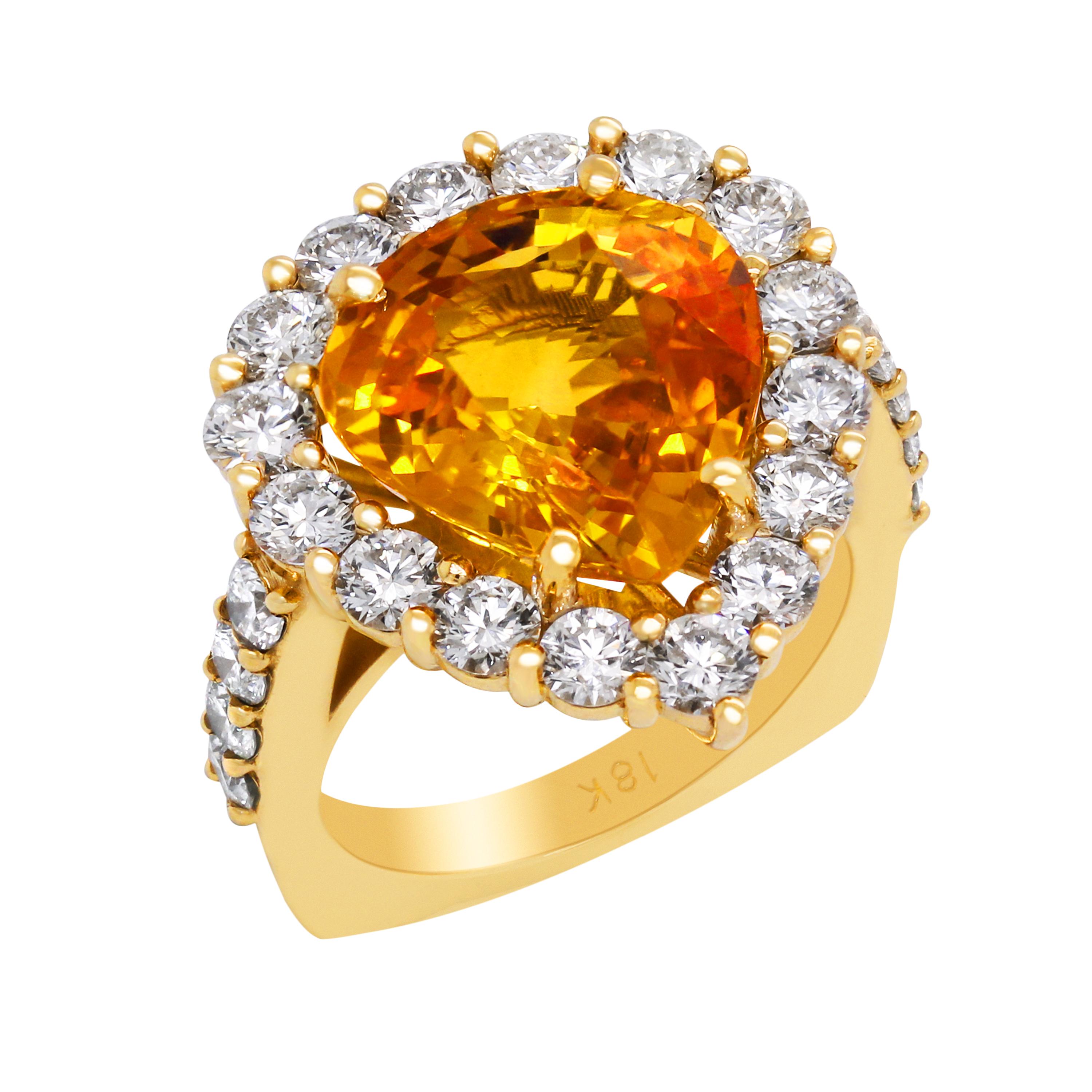 8.15 Carat Pear Shape Orange Sapphire 18 Karat Yellow Gold Diamond Cocktail Ring

This one-of-a-kind ring features a vibrant, orange sapphire that weighs 8.15 carat.

2.40 carat G color, VS clarity diamonds total weight.

Ring face is 20mm x 18mm.