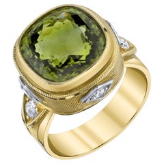 8.15 Carat Peridot Cushion and Diamond, Yellow and White Gold Bezel Ring