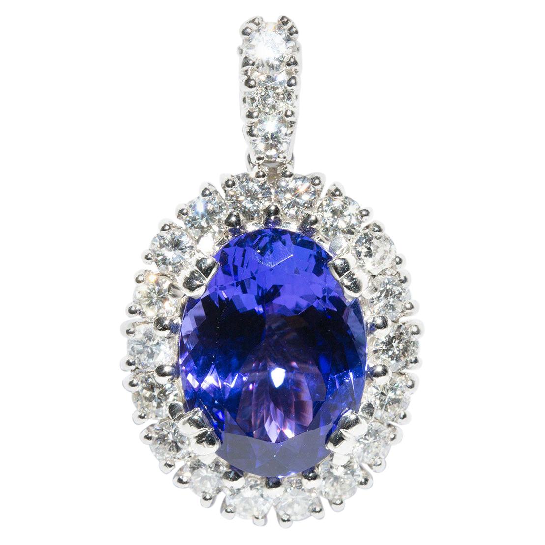8.16 Carat Flawless Oval Tanzanite and 1.92 Carat Diamond Halo Platinum Pendant