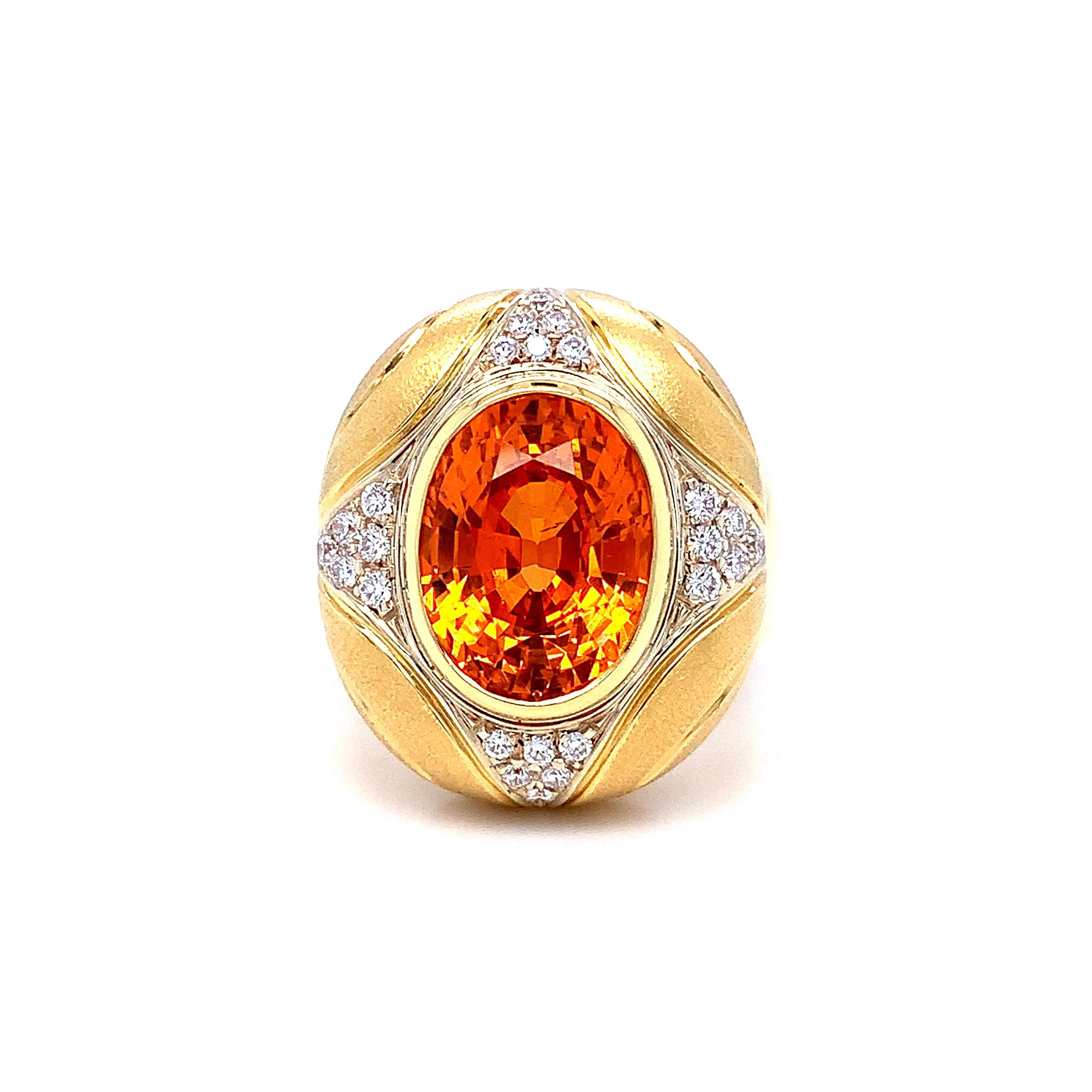 This is a collection worthy ring for the connoisseur of fine, rare gems, showcasing an unusually large and vivid orange color, 8.16 carat Mandarin spessartite garnet in a custom-designed domed bezel ring. The center stone is exceptionally well-cut