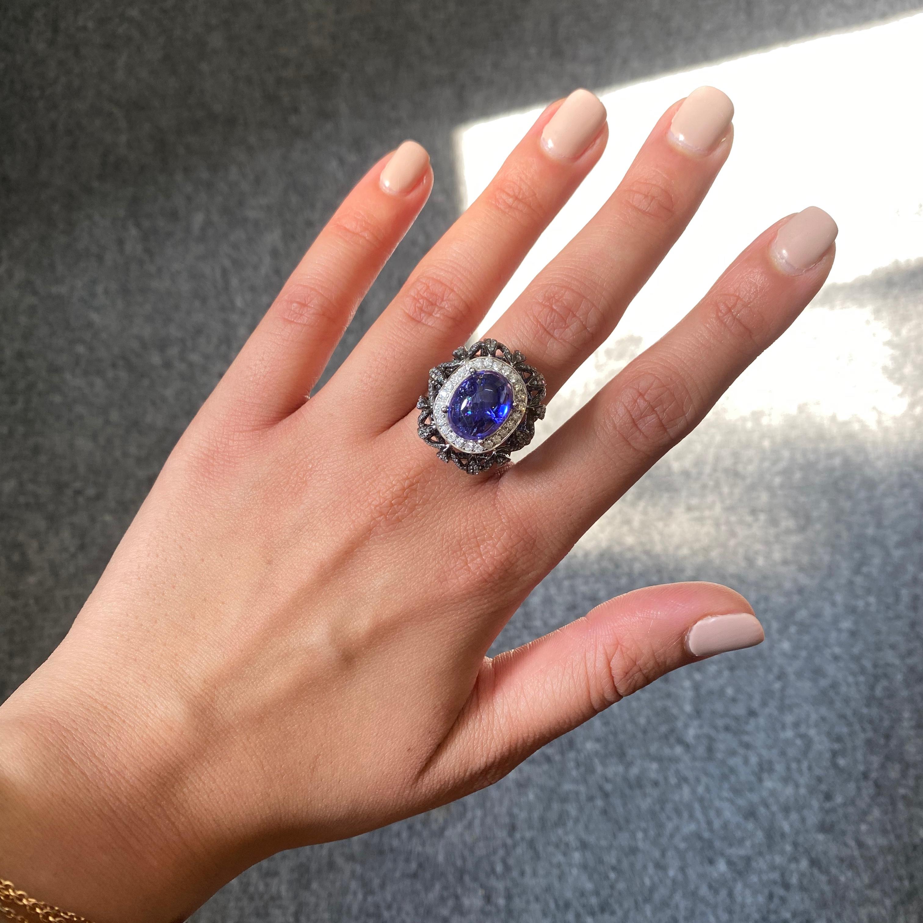 Modern 8.16 Carat Tanzanite Cabochon and Diamond 18K Gold Cocktail Ring For Sale
