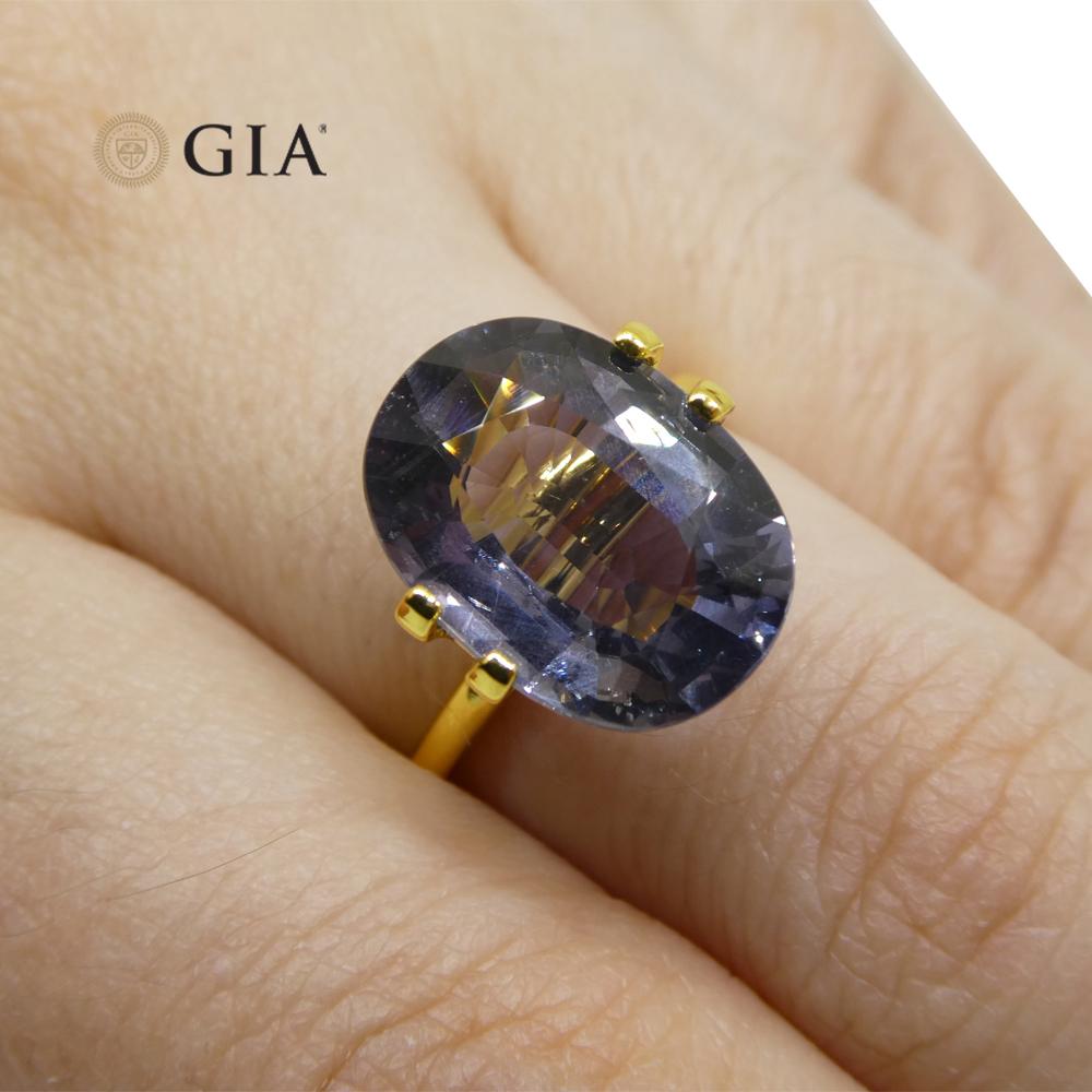 The GIA report reads as follows:

GIA Report Number: 2225341601
Shape: Oval
Cutting Style:
Cutting Style: Crown: Brilliant Cut
Cutting Style: Pavilion: Step Cut
Transparency: Transparent
Color: Grayish Violet changing to Pinkish Purple

