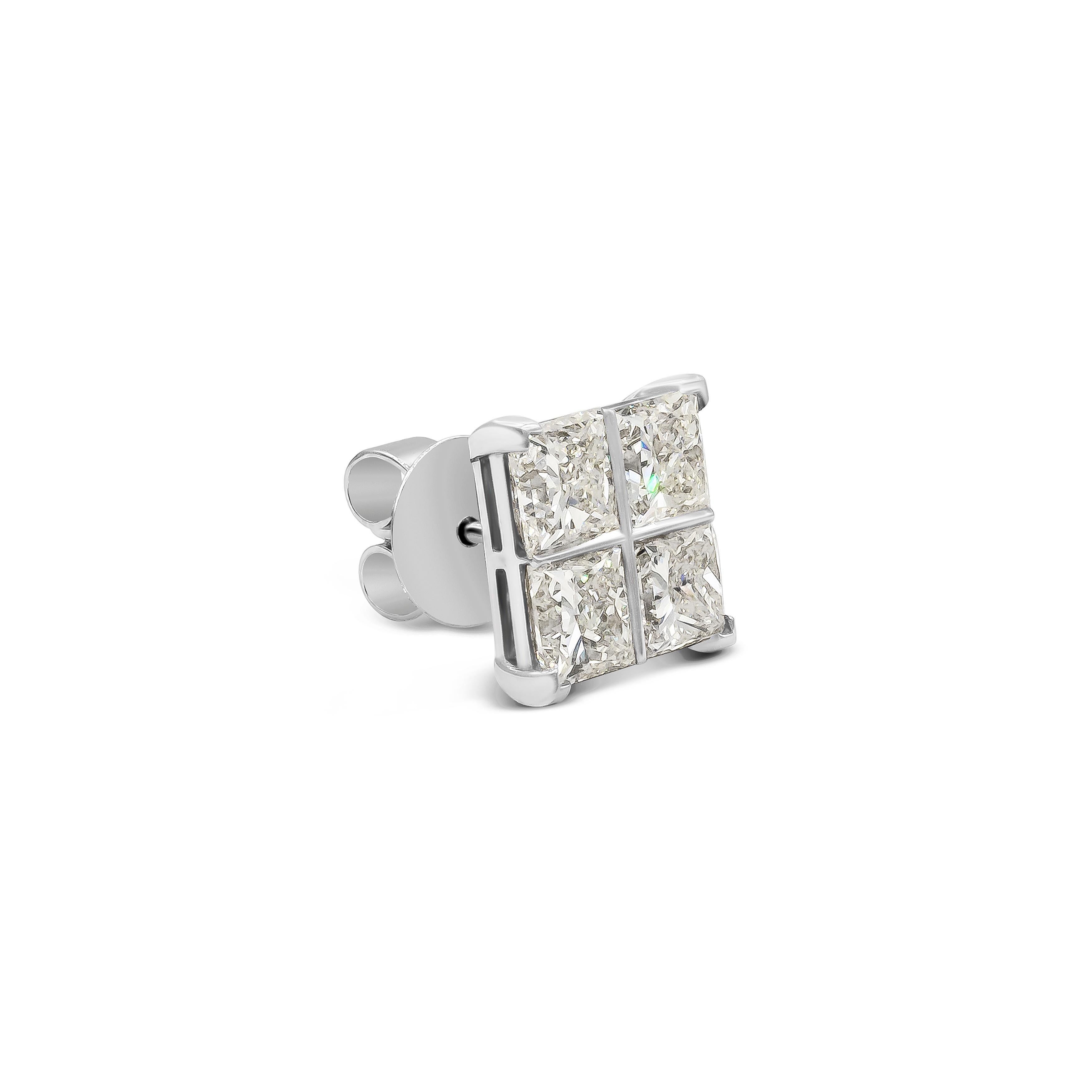 This pair of stud earrings feature 8 princess cut diamonds weighing 8.17 carats total, LM in color and VS+ in clarity.  Each earring has 4 diamonds set in such a way that it gives the impression of one large diamond earring. Set in 18K white gold.