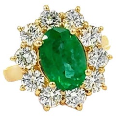 Bague pour femmes 14 carats avec émeraude et diamants