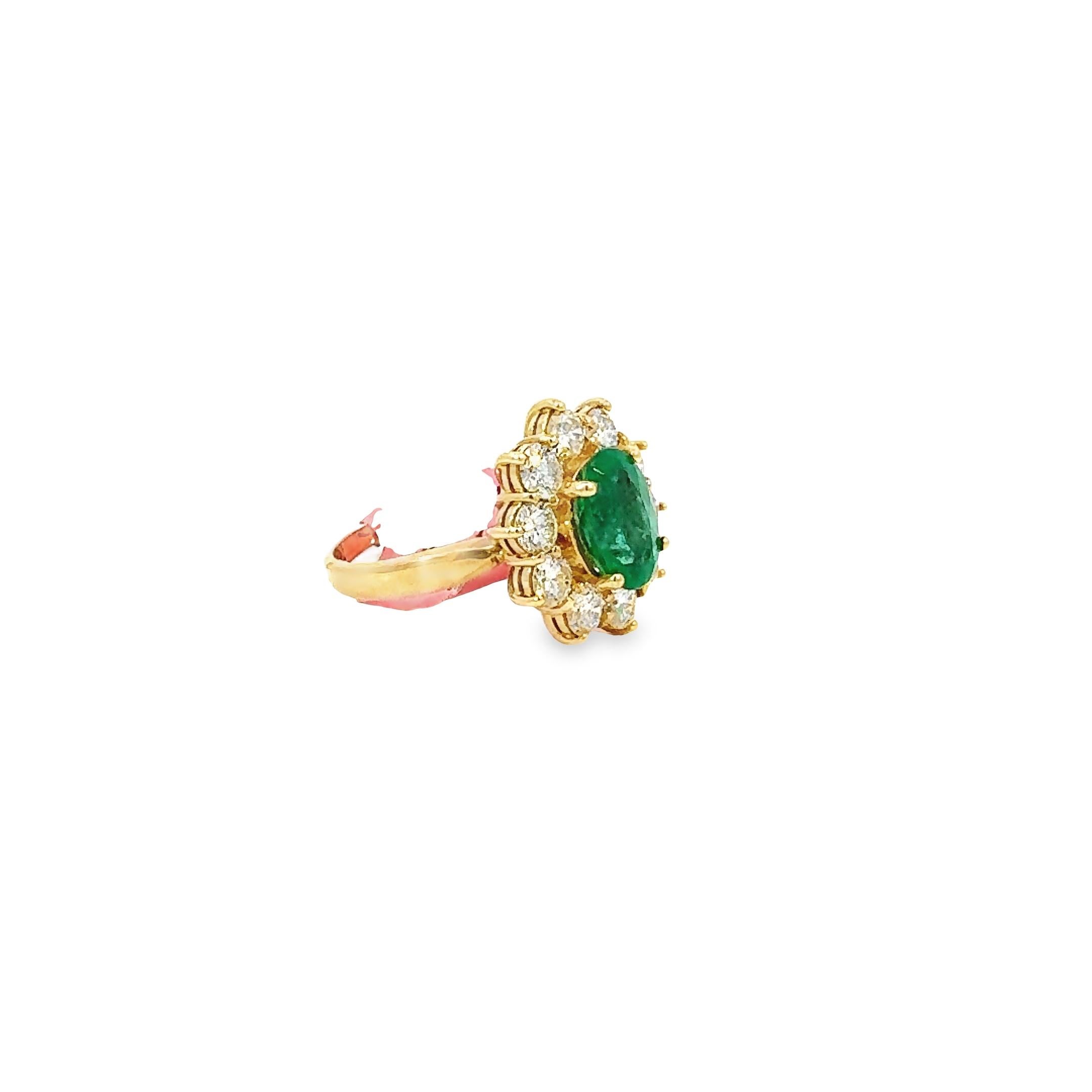 Item #8173

GGA - Gemassure Gemological Appraisals Certified
14K Ladies Ring with 1.83 carat Diamonds and 2.06 carat Emerald
Fourteen karat /14K yellow gold natural emerald beryl and diamond ring. An oval brilliant cut natural emerald beryl gemstone
