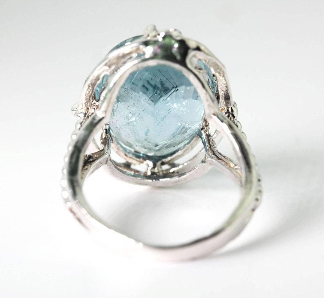 Oval Cut AJD Glittering Brilliant 8.18 Ct Blue-Green Aquamarine Silver Cocktail Ring For Sale