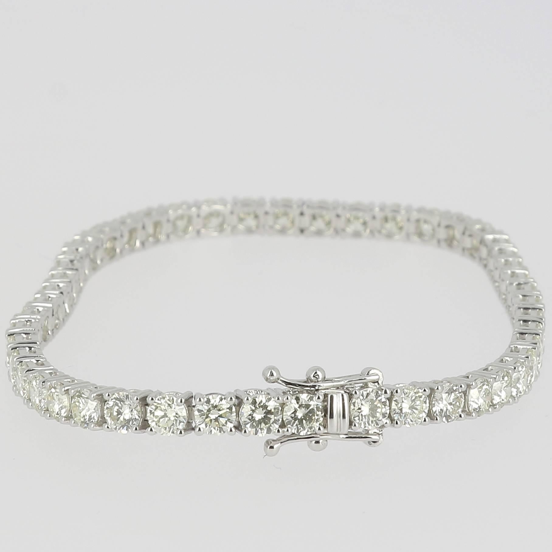 Beautiful And Classic Tennis Bracelet.
The Line Bracelet is 18K White Gold.
There are 8.18 Carats in Diamonds.
There are 48 stones, each Diamonds weight 0.17 Carats.
The Tennis Bracelet is inches 7,5 long (19 cm).
The Bracelet weight 12.68