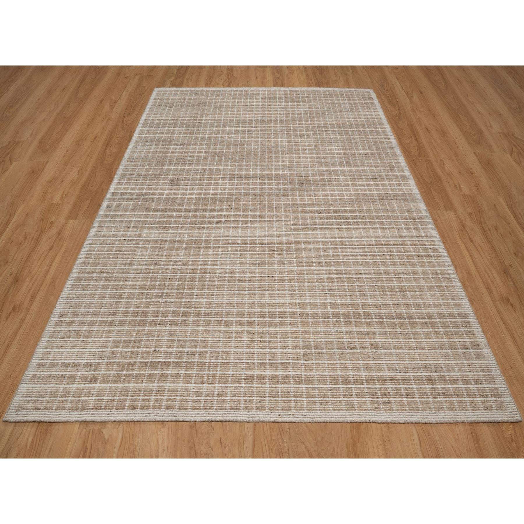 Frappe Brown, Loomed Knotted, Modern Plain Decor Box Design, Soft to the Touch, Pure Wool, Oriental Rug
Primary materials: Wool
Latex: No Pile 
height: 0.25 Inches
Style: Contemporary
Primary color: Brown
Secondary colors: Ivory
Pattern: Oriental