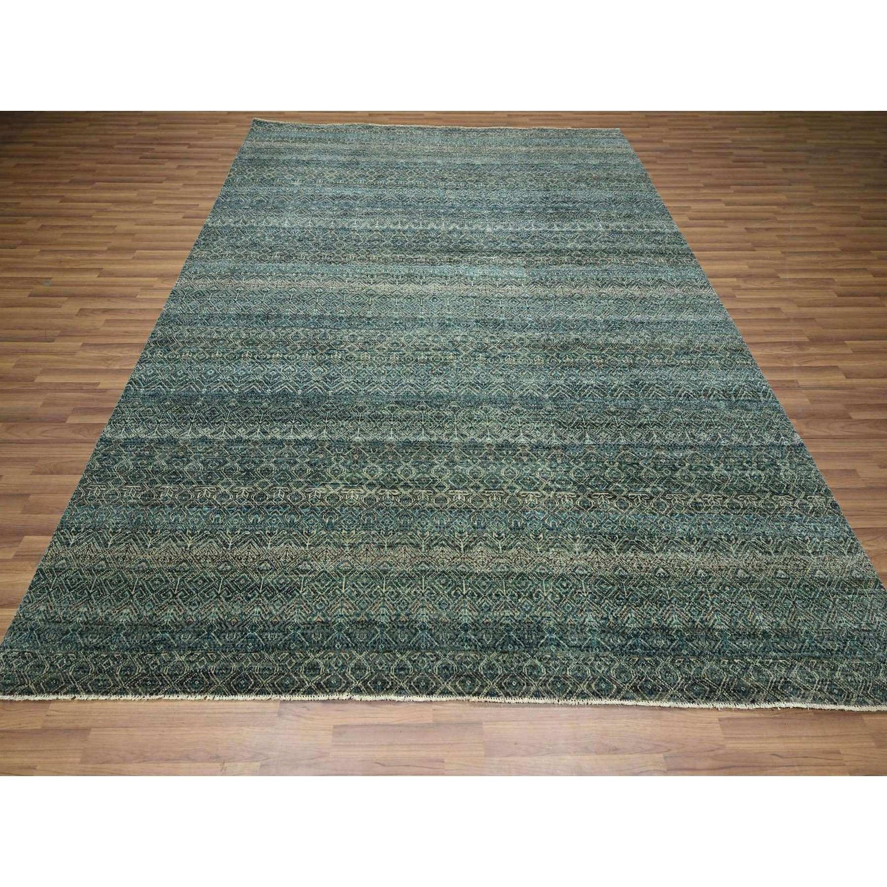 Vert sarcelle, noué à la main, motif Kohinoor Herat, petit motif géométrique répétitif en forme de diamant, laine douce, ton sur ton, tapis oriental
Matières premières : Laine
Latex : Pas de poils 
hauteur : 0,25 pouces
Style : Contemporain
Couleur