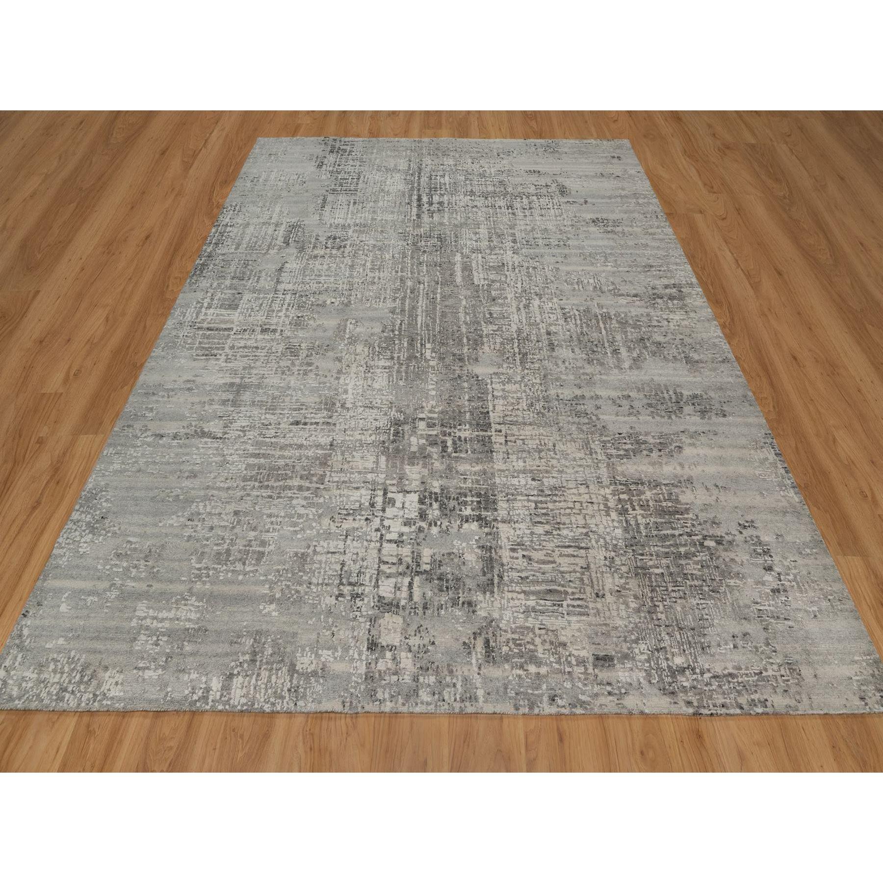 Grigio chiaro, Design moderno cancellato, Annodato a mano, Filato a mano in lana naturale non colorata, Tappeto orientale
Materiali primari: Lana
Lattice: No Pile 
altezza: 0,25 pollici
Stile: Contemporaneo
Colore primario: Grigio
Colori secondari: