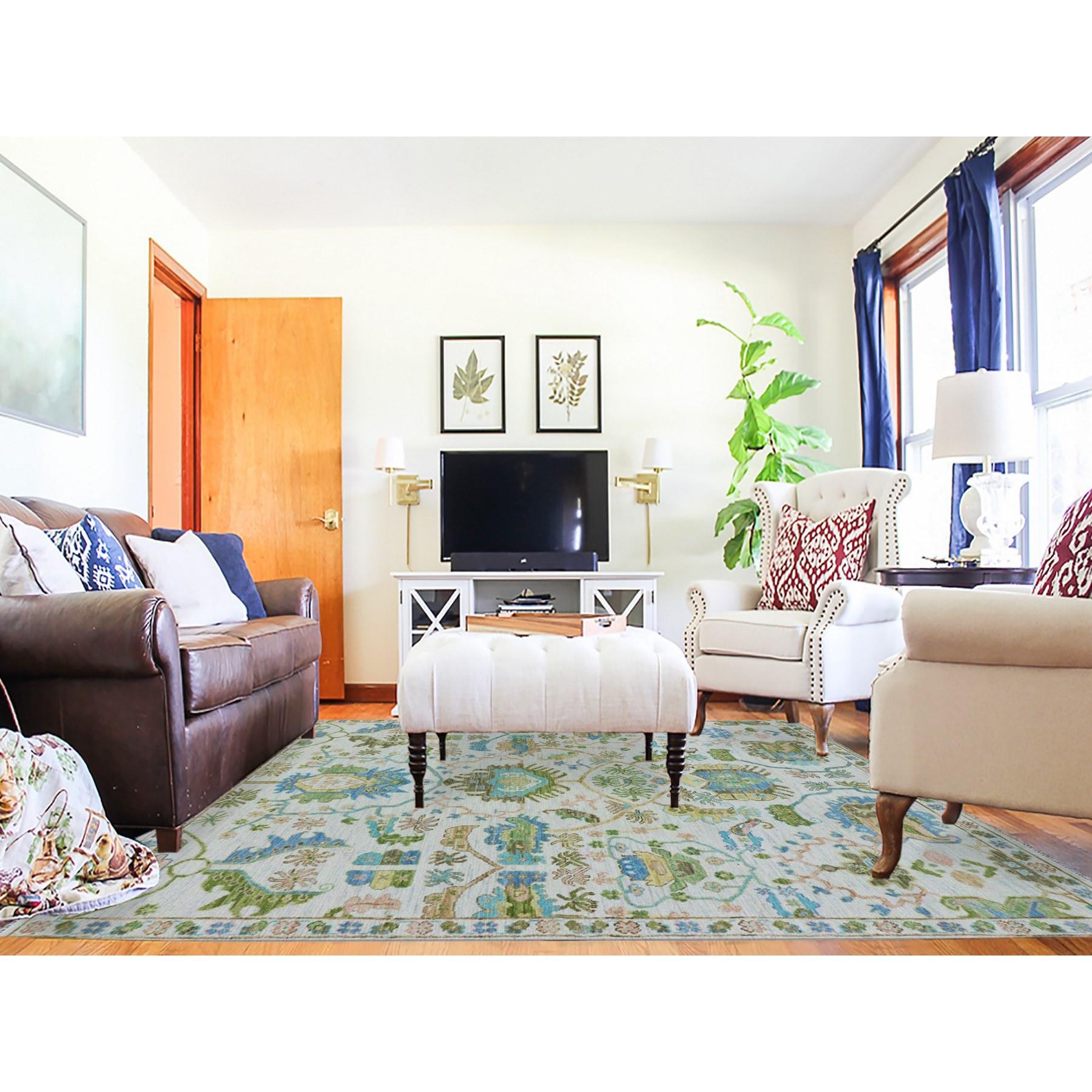 Spring White, Vegetable Dyes, Colorful Oushak Weave and Design, Hand Knotted, 100% Wool, Oriental Rug
Primary materials: Wool
Latex: No Pile 
height: 0.25 Inches
Style: Transitional
Primary color: Ivory
Secondary colors: Blue, Peach Color, Green,