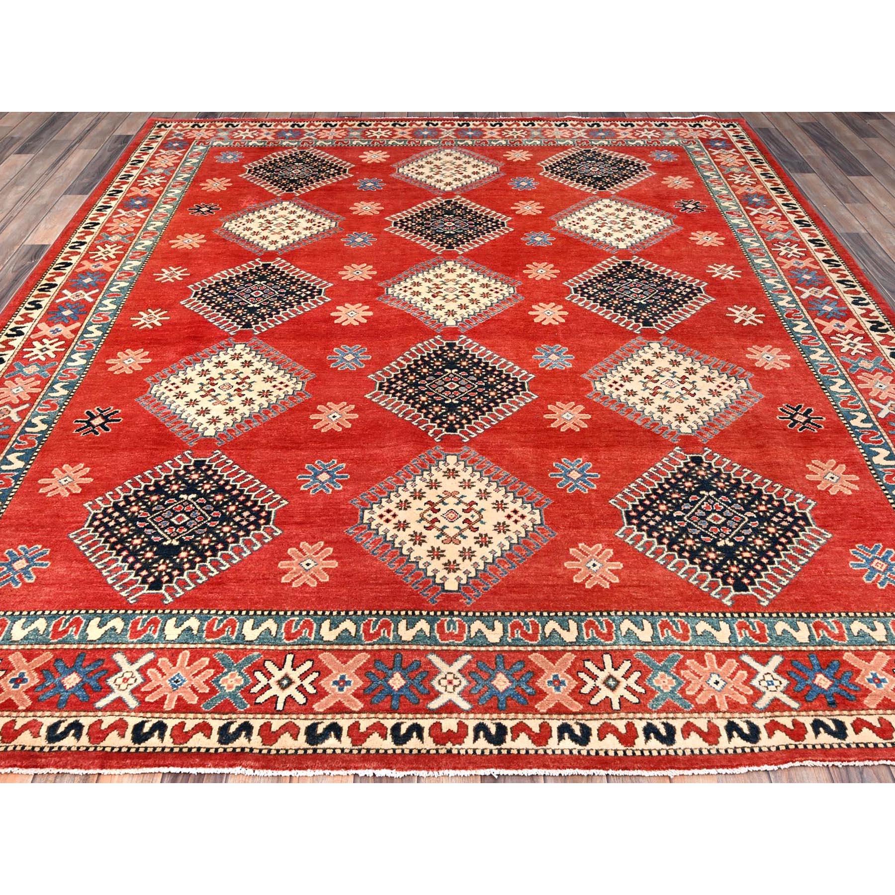 This is a truly genuine one-of-a-kind Special Kazak, Hand Knotted, Pure Wool, Oriental Rug. It has been Knotted for months and months in the centuries-old weaving craftsmanship techniques by expert artisans.
Primary materials: Wool
Latex: No Pile