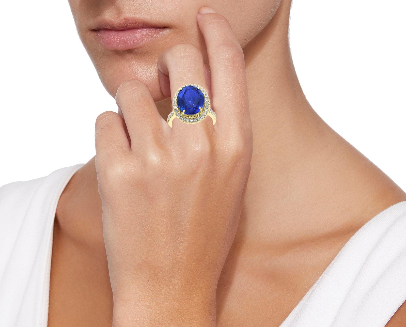 Oval Cut 8.2 Carat Oval Tanzanite and 1.2 Carat Diamond Ring 18 Karat Yellow Gold