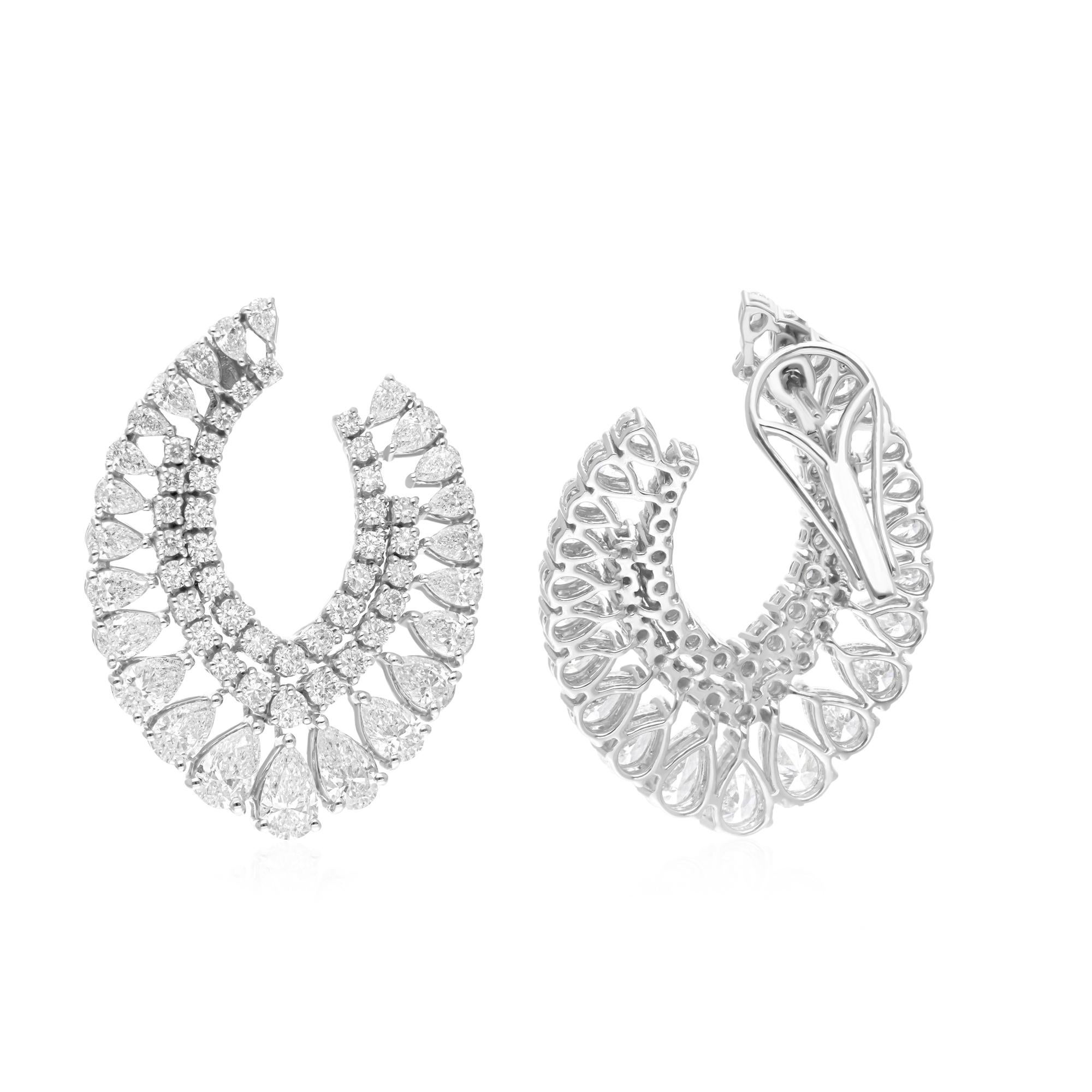 Cast from 14-karat gold, these exquisite earrings are handset with 8.24 carats of sparkling diamonds.

FOLLOW SPECTRUM JEWELS storefront to view the latest collection & exclusive pieces. Spectrum Jewels is proudly rated as a Top Seller on 1stdibs