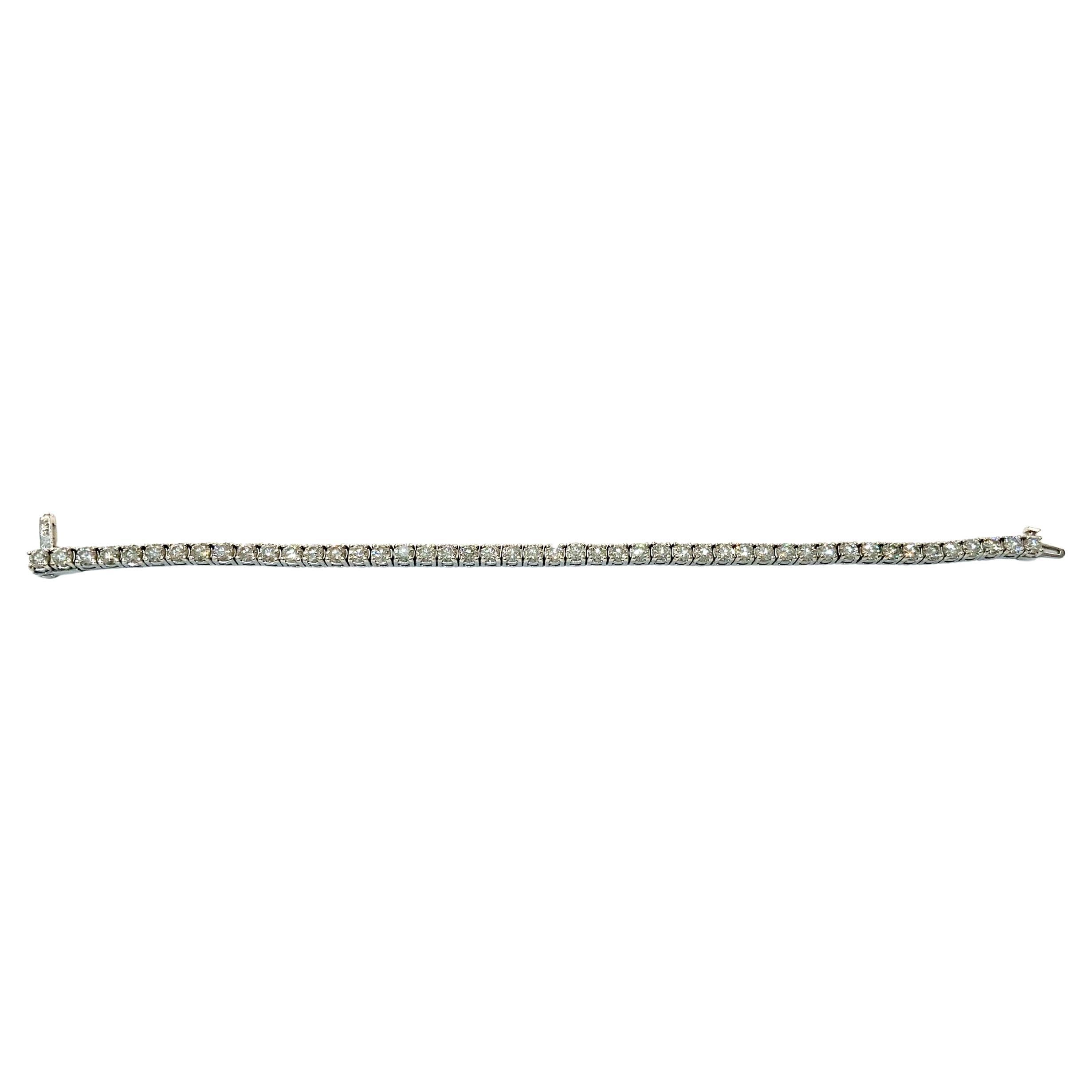 Designed to hold 8.20 Carat Diamond VS1 ( Fine Quality ) in G Color, this classic and gorgeous tennis Bracelet in White Gold has 47 Sparkling round brilliant cut diamonds. This sophisticated tennis bracelet keeps securely on the wrist when worn,