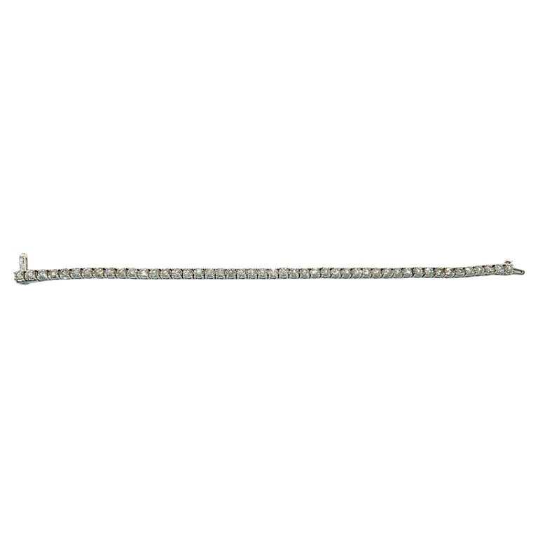 This timeless tennis Bracelet feature 47 sparkling diamonds in VS-2 Quality in G-H Color.
The bracelet keeps securely on the wrist when worn, making it suitable for frequent wear. 


Total Diamond Weight: 8.20 ct  No. of Diamonds: 47 Diamond Color: