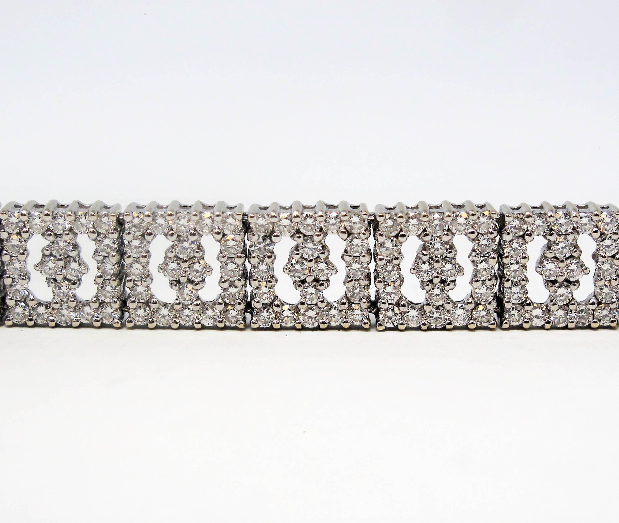 This square link diamond bracelet brings sparkling beauty to your wrist. The sleek, clean lines and unique cut-outs enhance the unmistakable elegance of this beautiful piece.  

This simply stunning bracelet features an incredible 8.20 carats total
