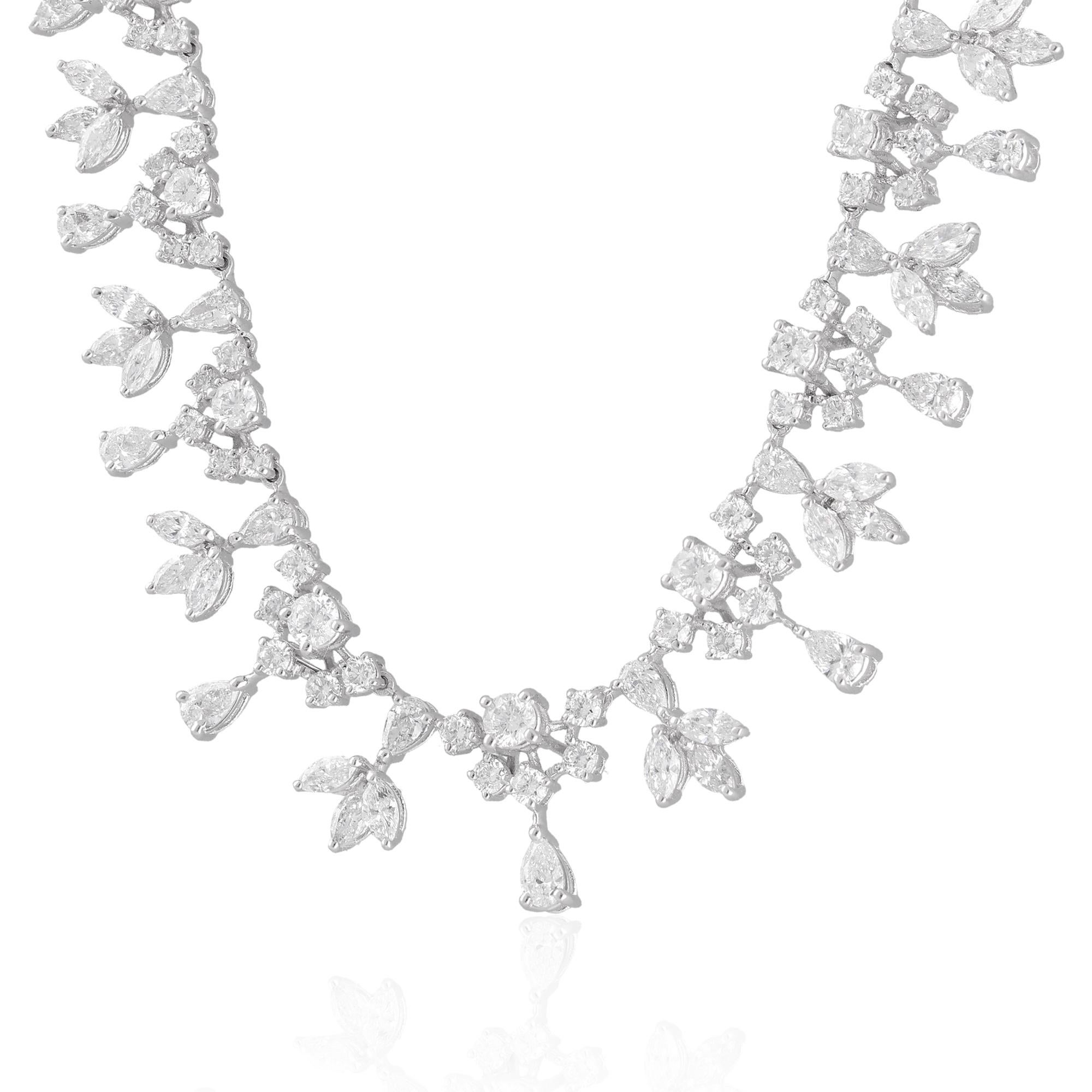 It sounds like we're describing a necklace made from 14 karat white gold, featuring a combination of round, pear-shaped, and marquise diamonds with a total weight of 8.20 carats. This necklace is categorized as fine jewelry due to the use of