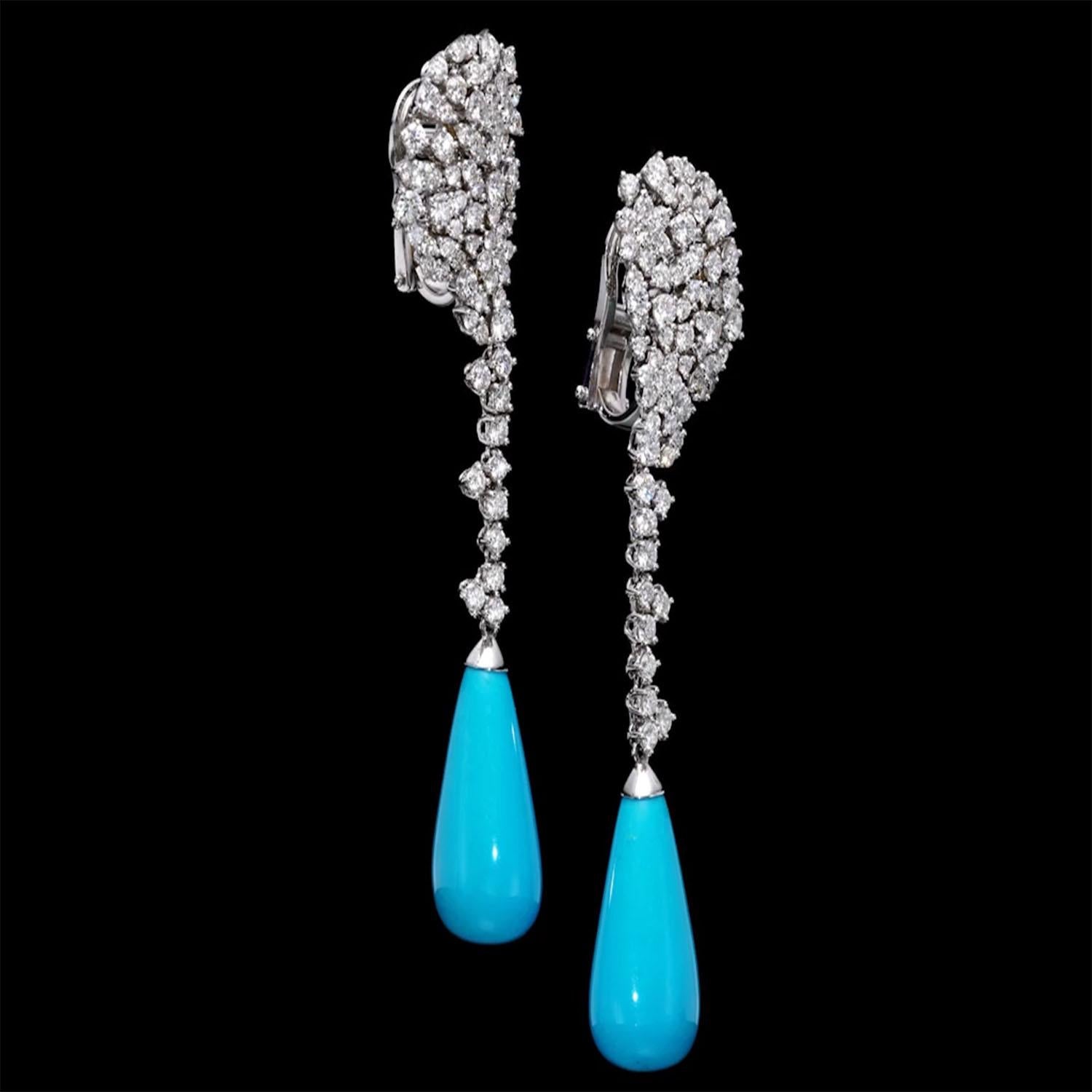 This gorgeous Turquoise Drop earrings will impress everyone around you. It features a briolette 8.20 carat gemstone, adorned with 4.36  carat natural diamonds. White gold 18K

Main stone:
Briolette Turquoise 
Number: 2
Carat: 8.20 carat 
Color: