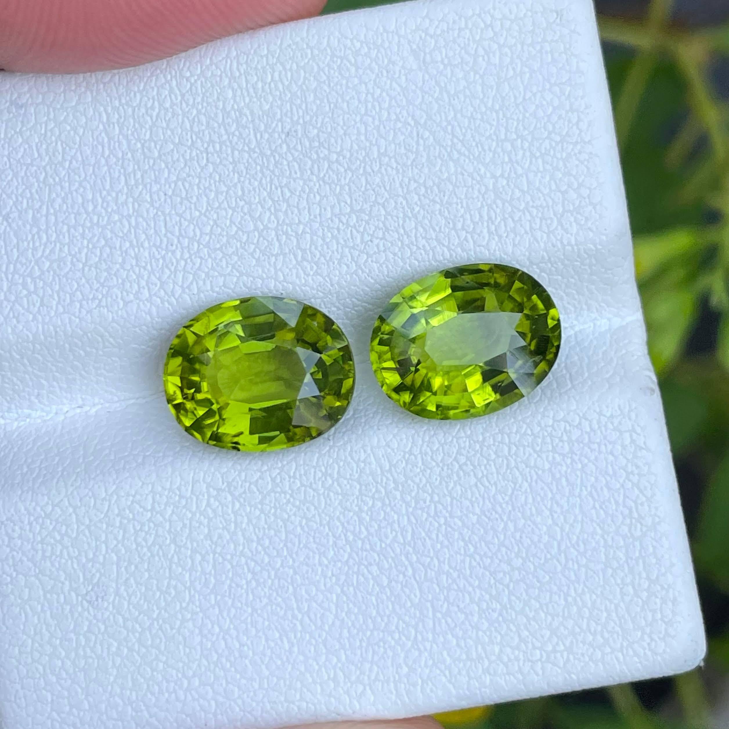 Women's or Men's 8.20 carats Green Loose Peridot Pair Fancy Oval Cut Natural Pakistani Gemstone For Sale