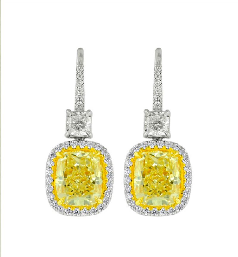 These magnificent yellow diamond earrings are custom-made and designed by Diana M. for her Fall 2016 Collection.

The total weight of certified Yellow diamonds is 8.22 Carats, Fancy Light Yellow, VS in Clarity. Certified by  Laboratory.
Yellow