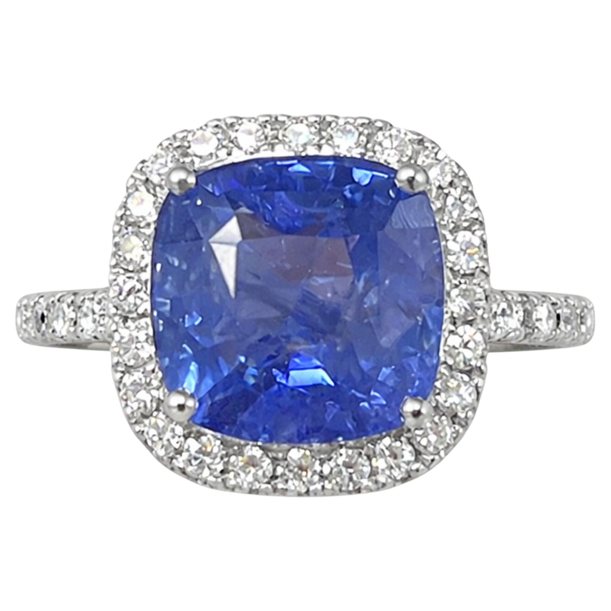 8.22 Carat cushion Sapphire & Halo Diamonds studded Ring in 18K White Gold