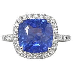 8.22 Carat cushion Sapphire & Halo Diamonds studded Ring in 18K White Gold