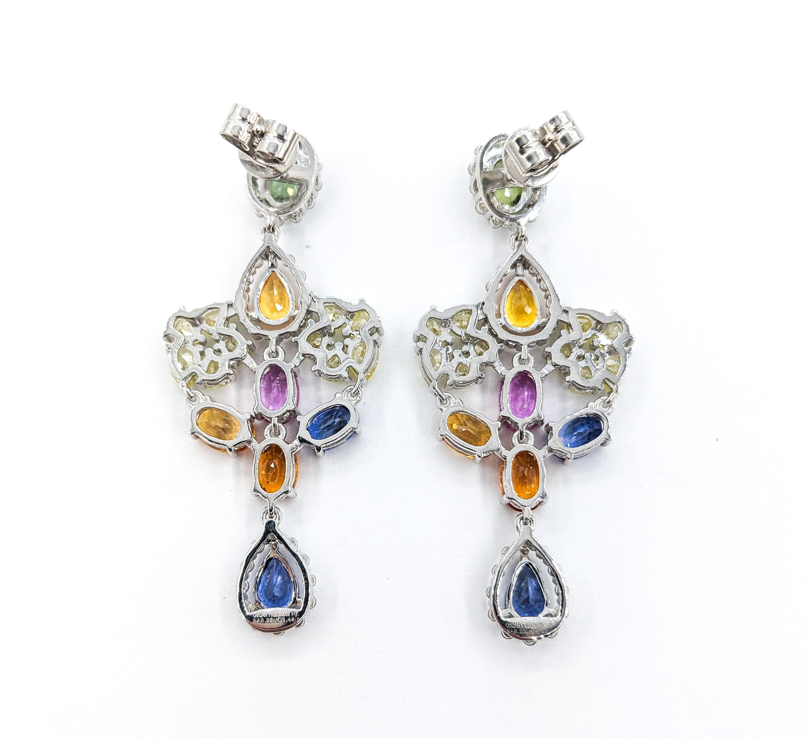 8.22ctw multi-color sapphires 3.44ctw Diamonds Dangle Esarrings In White Gold

Introducing a magnificent pair of Multi-color Sapphire Dangle Earrings, masterfully crafted in 14k white gold. These earrings showcase an exquisite combination of 3.44ctw