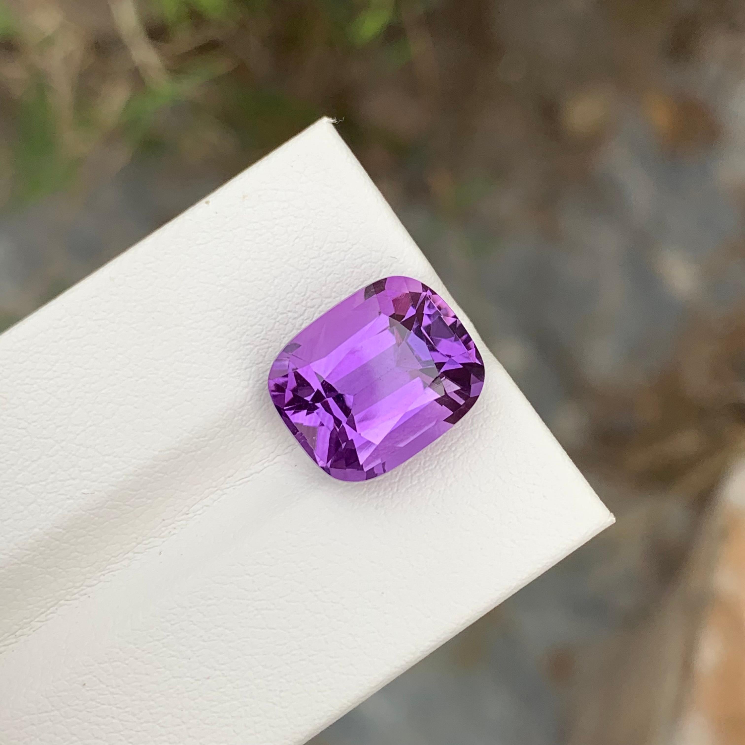 Loose Amethyst
Weight: 8.25 Carats
Dimension: 13.4 x 11.1 x 8.6 Mm
Colour: Purple
Origin: Brazil
Treatment: Non
Certificate: On Demand
Shape: Cushion 

Amethyst, a stunning variety of quartz known for its mesmerizing purple hue, has captivated