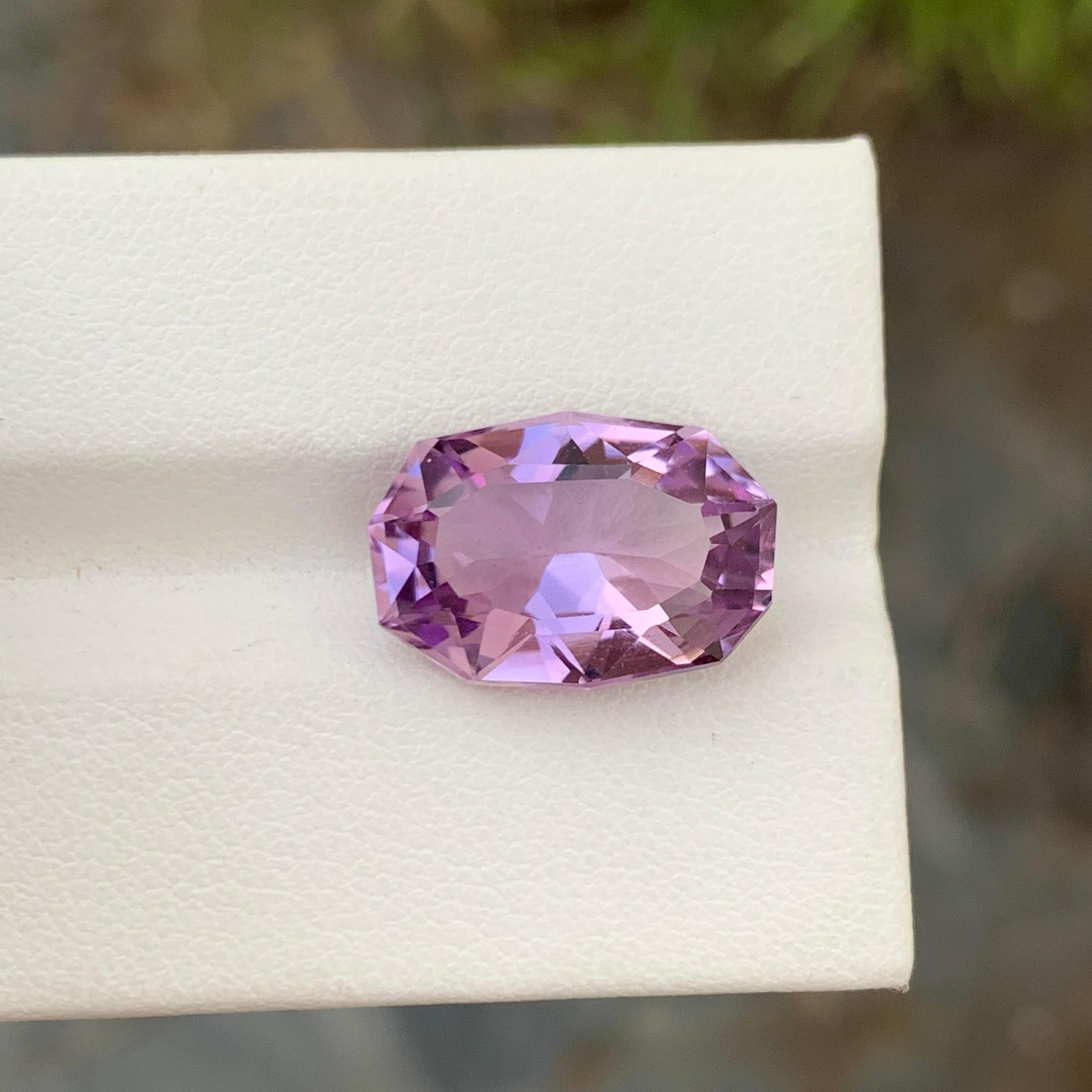 Loose Amethyst 
Weight: 8.25 Carat 
Dimension: 15.9 x 11 x 8 Mm 
Origin: Brazil 
Treatment: None 
Cut : Fancy Cut 
Shape : Polygon 
Certificate: On Demand 

Amethyst, a regal member of the quartz family, is a captivating gemstone celebrated for its