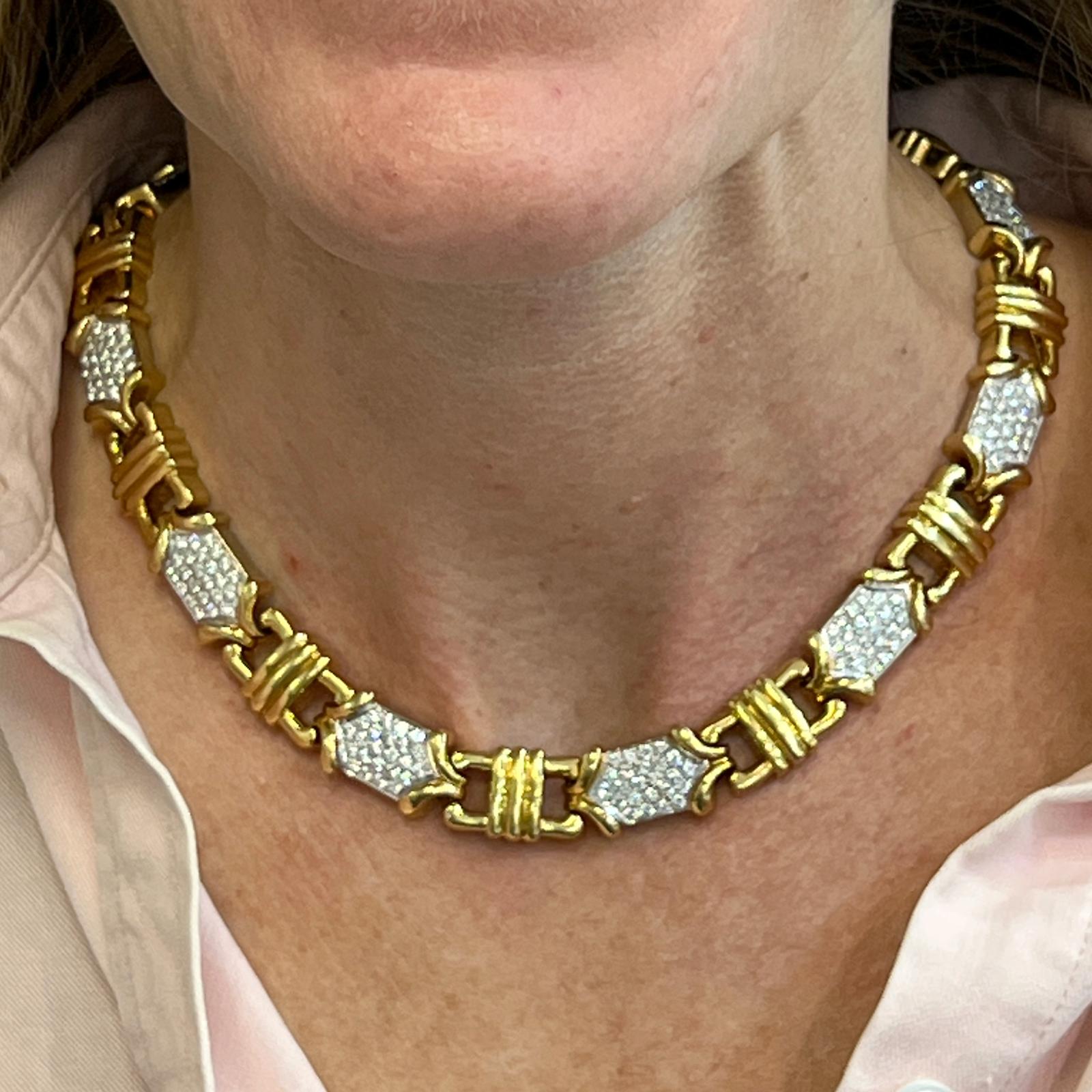 Stunning pave diamond link necklace fashioned in solid 18 karat yellow gold. The necklace features 264 round brilliant high quality diamonds weighing approximately 8.25 carat total weight. The diamonds are graded G-H color and VS clarity. The