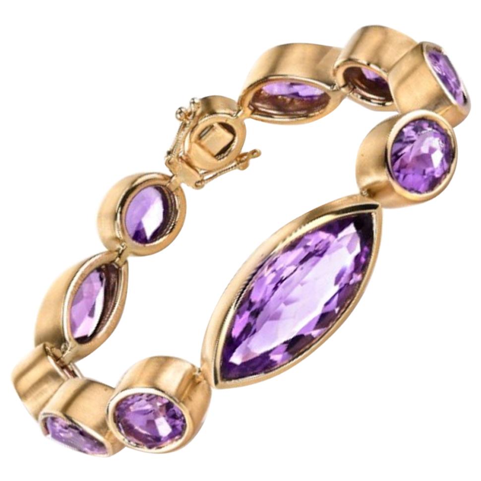 82.64 Carat Total Amethyst Marquise & Oval Bezel Yellow Gold Tennis Bracelet For Sale