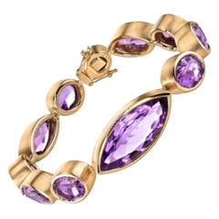82.64 Carat Total Amethyst Marquise & Oval Bezel Yellow Gold Tennis Bracelet