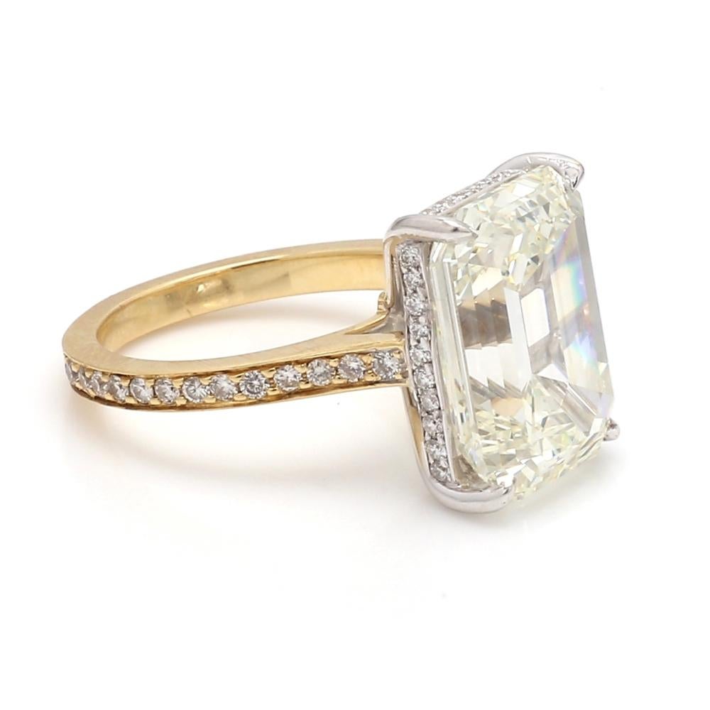 8.26ct Emerald Cut Diamond Ring

A stunning 8.26 carat emerald cut diamond, internally flawless clarity, L color grade.
Set in a sleek band adorned with additional diamonds.
Gold band with intricate detailing.
Ring size 4.5, sizable for a perfect