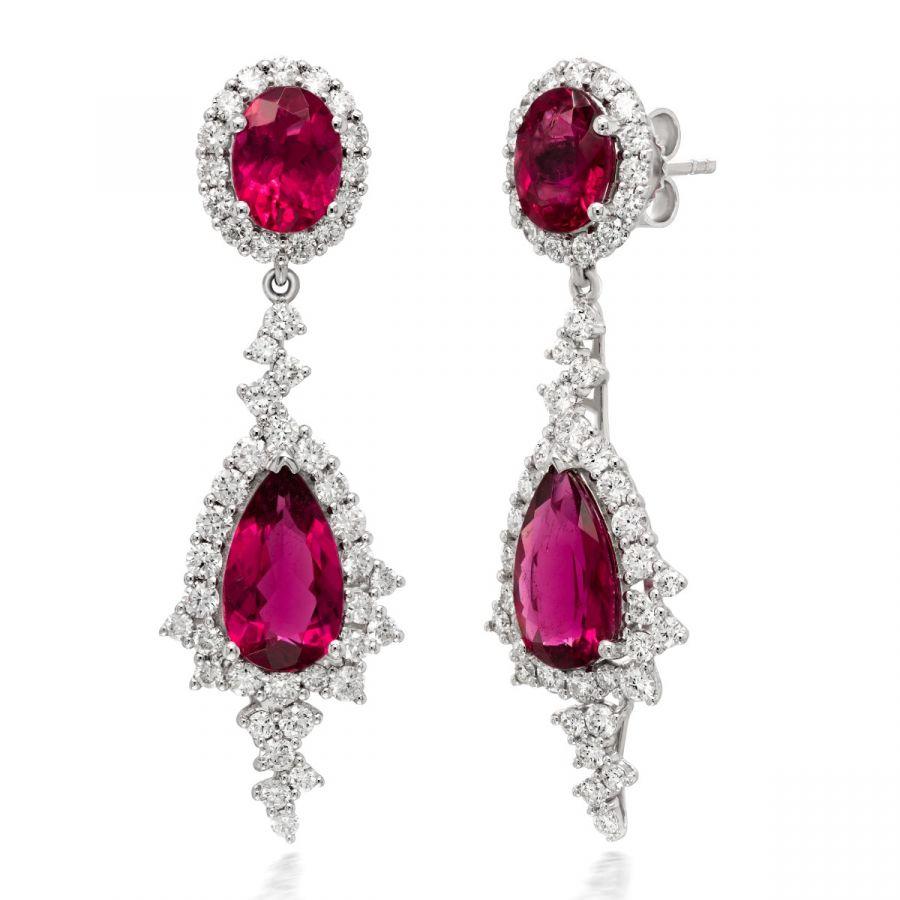 Indulge in the allure of Rubellites, a vibrant fuchsia pink gemstone from the illustrious tourmaline family. These cascading Rubellite earrings exhibit a rich bougainvillea pink, brought to life by flawless cuts that catch the light exquisitely.