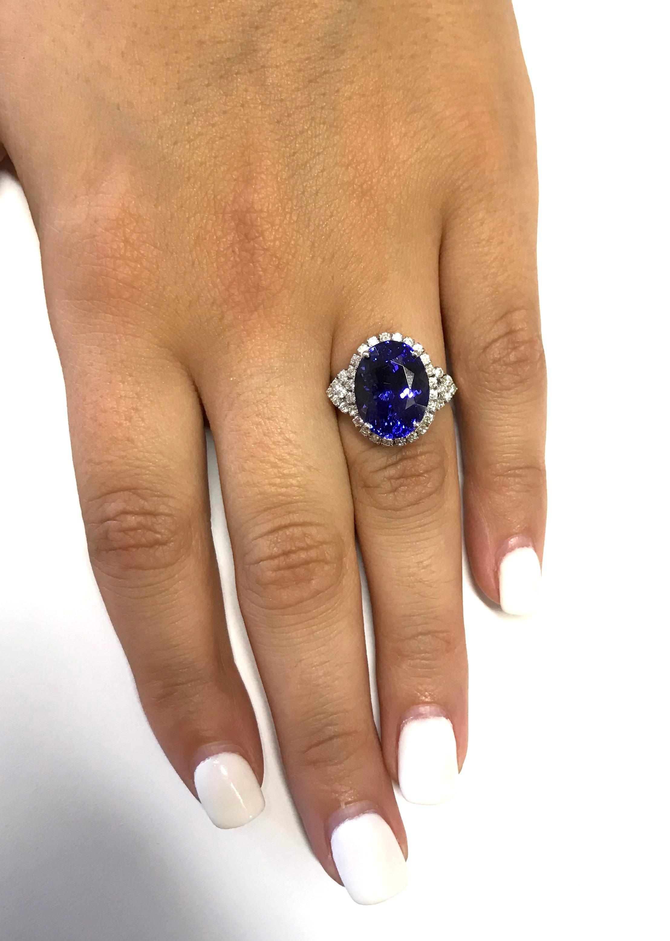 A truly stunning piece, this 8.28 Carat Oval Tanzanite shines against its 14K White Gold setting encased with brilliant white diamonds. A piece to treasure for years to come! 

Material: 14k White Gold 
Center Stone Details: 8.28 Carat Oval