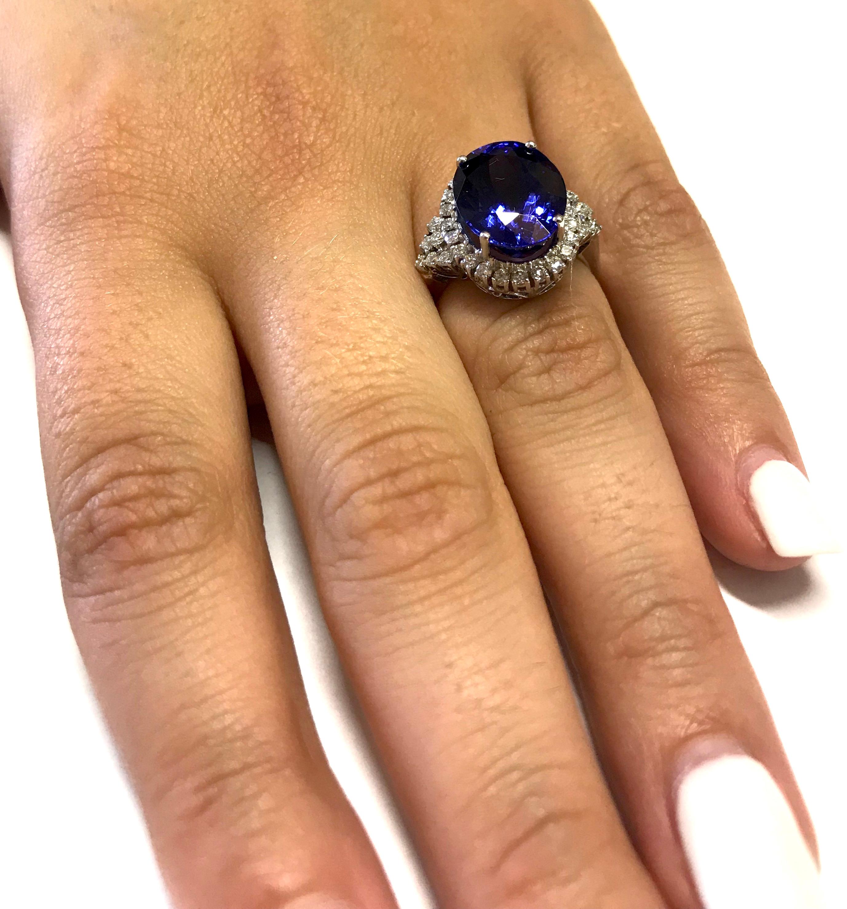 Contemporary 8.28 Carat Oval Tanzanite Engagement Ring For Sale
