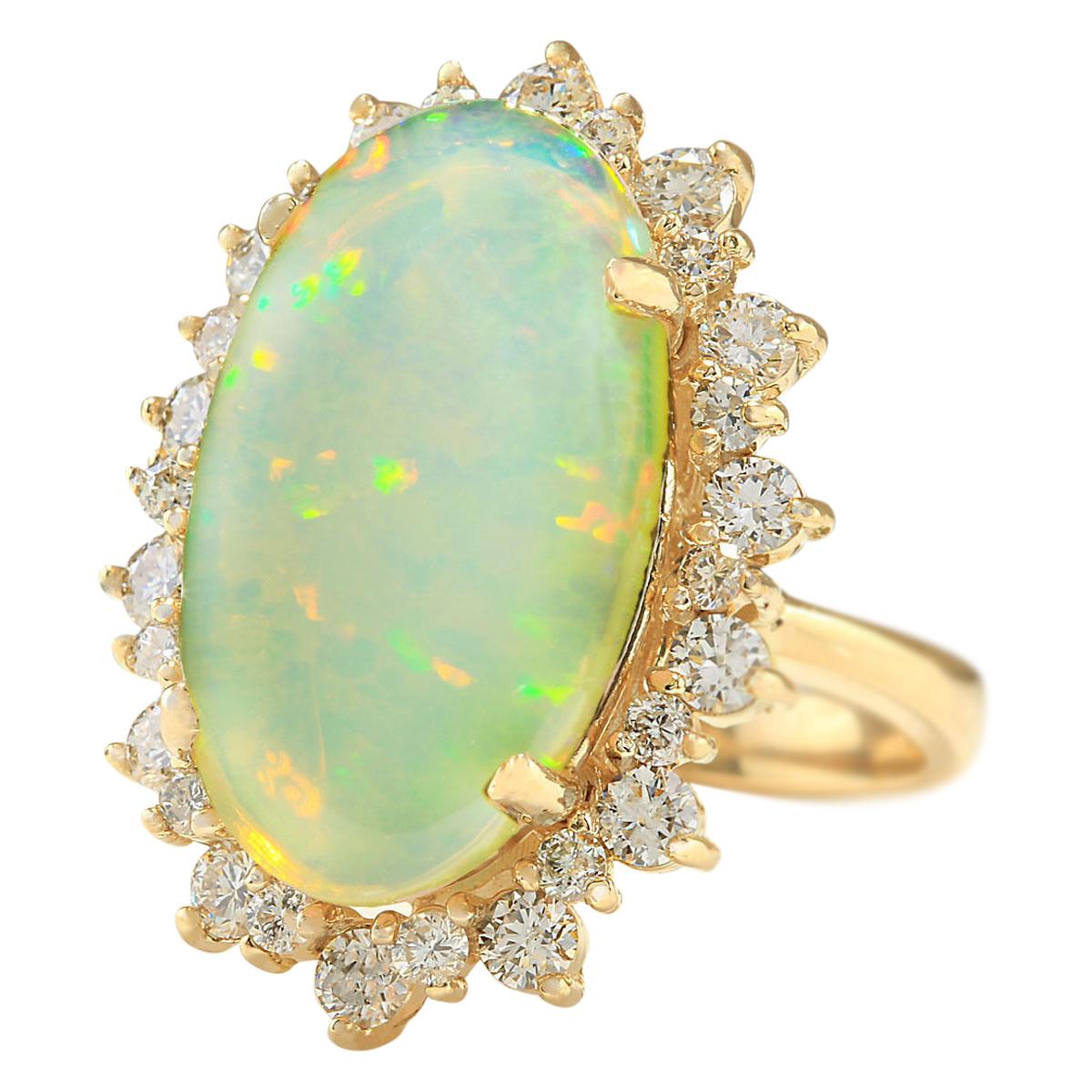 Stamped: 14K Yellow Gold
Total Ring Weight: 8.8 Grams
Total Natural Opal Weight is 7.09 Carat (Measures: 20.00x12.00 mm)
Color: Multicolor
Total Natural Diamond Weight is 1.20 Carat
Color: F-G, Clarity: VS2-SI1
Face Measures: 26.65x18.75 mm
Sku:
