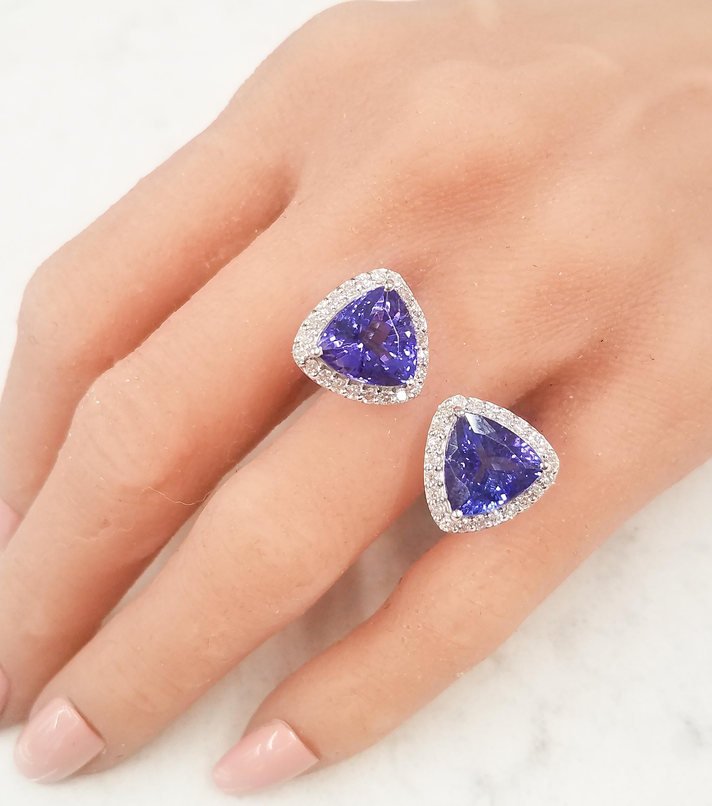 An architecturally beautiful design, our Two Stone Non-connect Ring has two faceted tanzanites, totaling 8.29 carats, that appear to float on your hand. The gem source is near the foothills of Mt. Kilimanjaro in Tanzania. Its color is vivid and