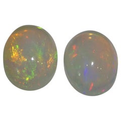 Coppia di 8,29ct Cabochon ovali di cristallo bianco opale dall'Etiopia