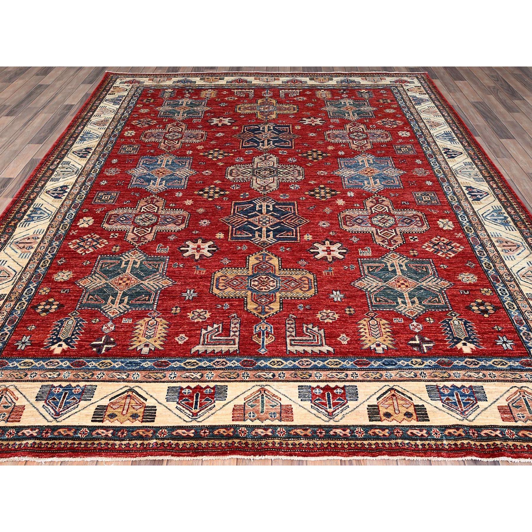 This is a truly genuine one-of-a-kind Super Kazak, Hand Knotted, Pure Wool, Oriental Rug. It has been Knotted for months and months in the centuries-old weaving craftsmanship techniques by expert artisans.
Primary materials: Wool
Latex: No Pile